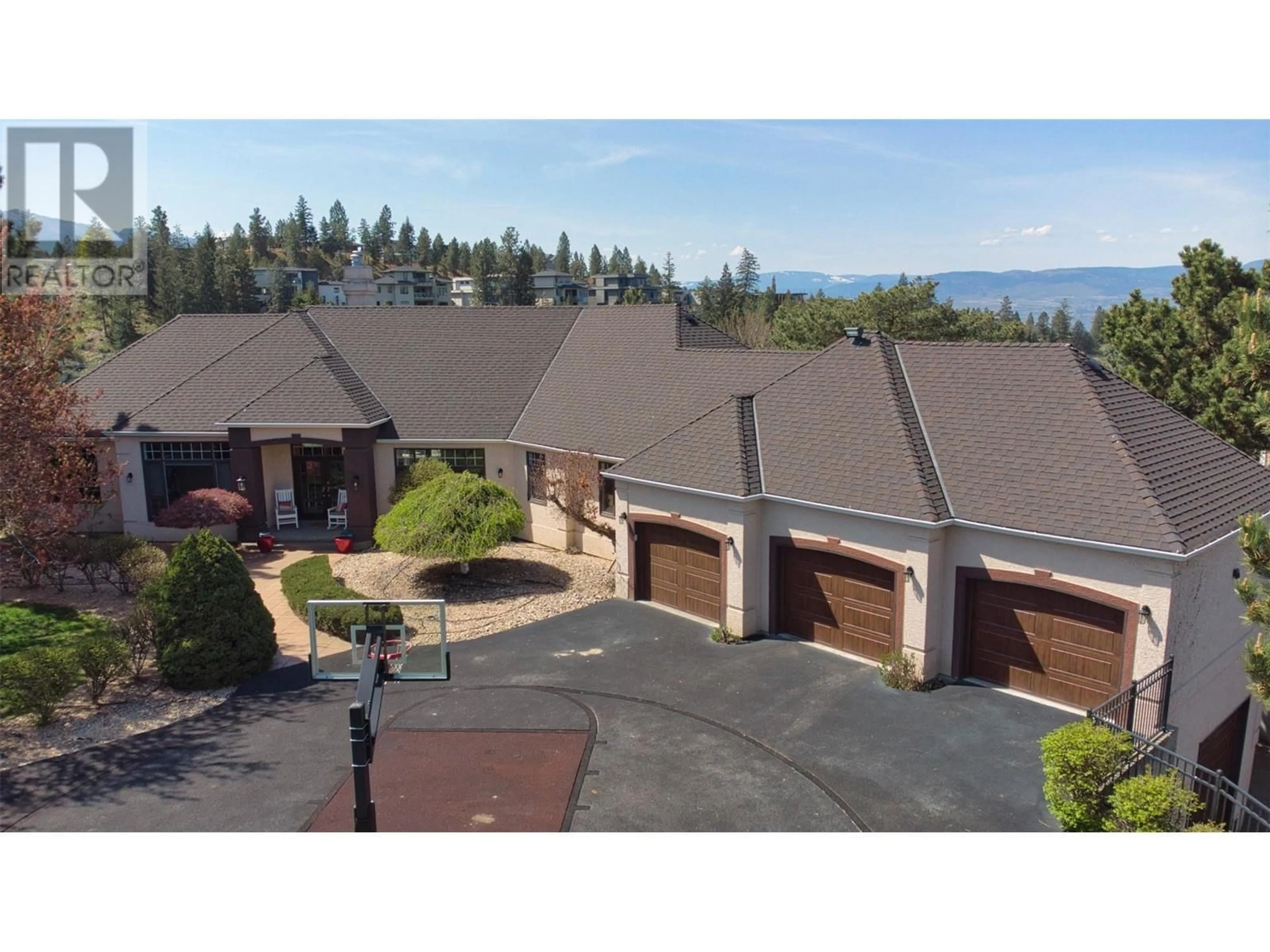 A pic from outside/outdoor area/front of a property/back of a property/a pic from drone, mountain view for 1117 CRAWFORD ROAD, Kelowna British Columbia V1W4N4