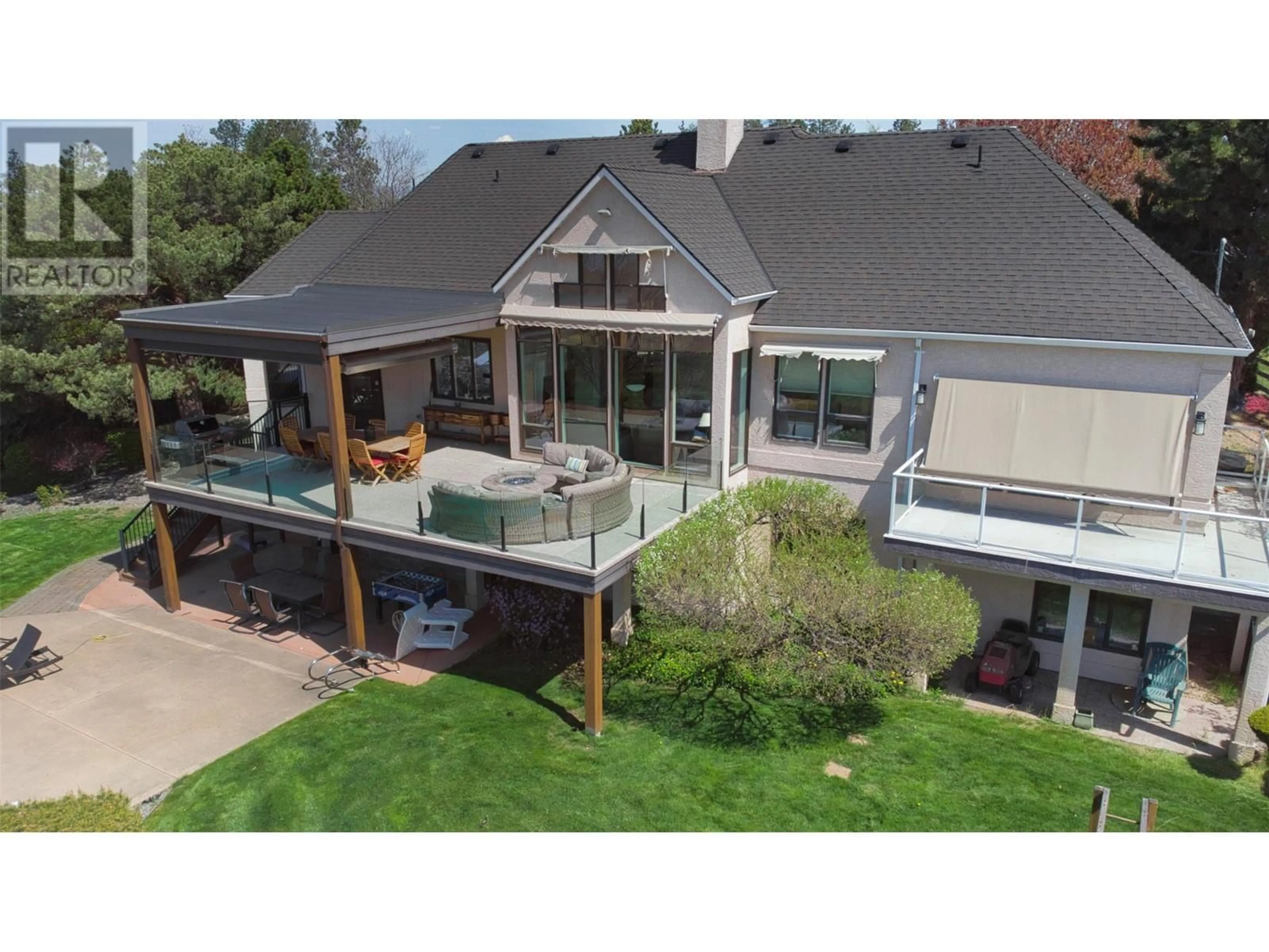A pic from outside/outdoor area/front of a property/back of a property/a pic from drone, unknown for 1117 CRAWFORD ROAD, Kelowna British Columbia V1W4N4