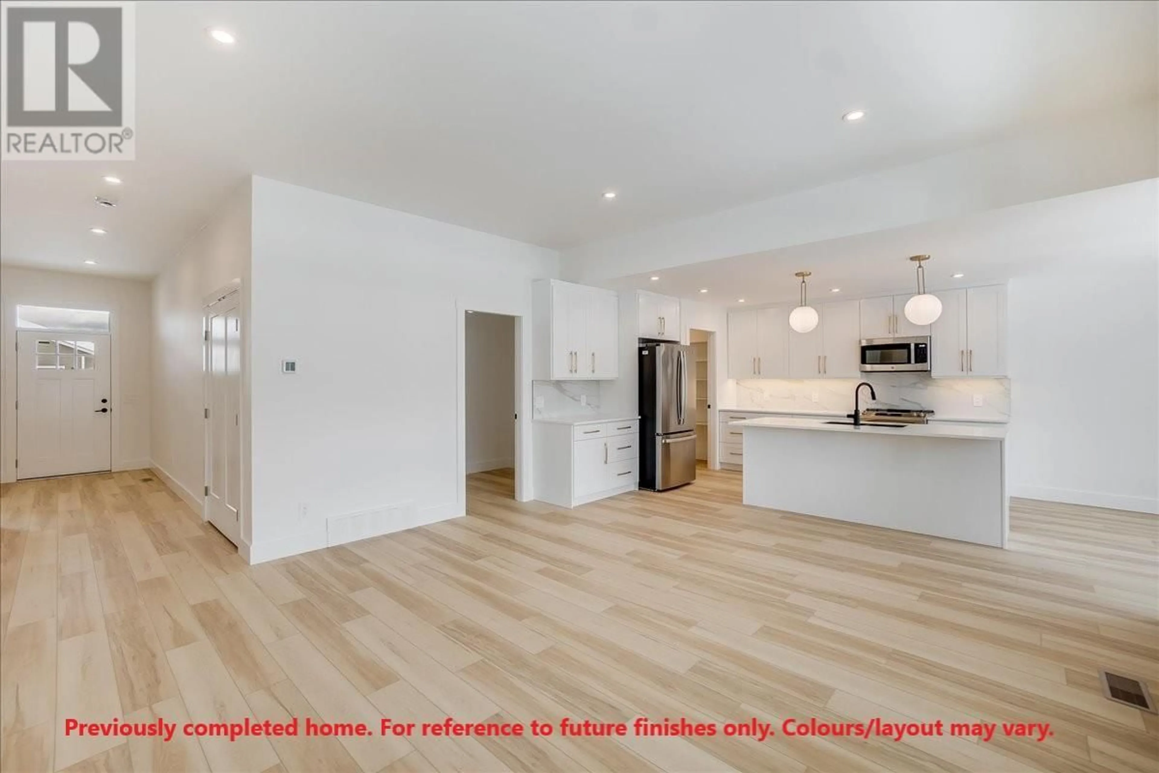 Open concept kitchen, wood/laminate floor for 1509 ASPEN LANE, Castlegar British Columbia V1N4X8