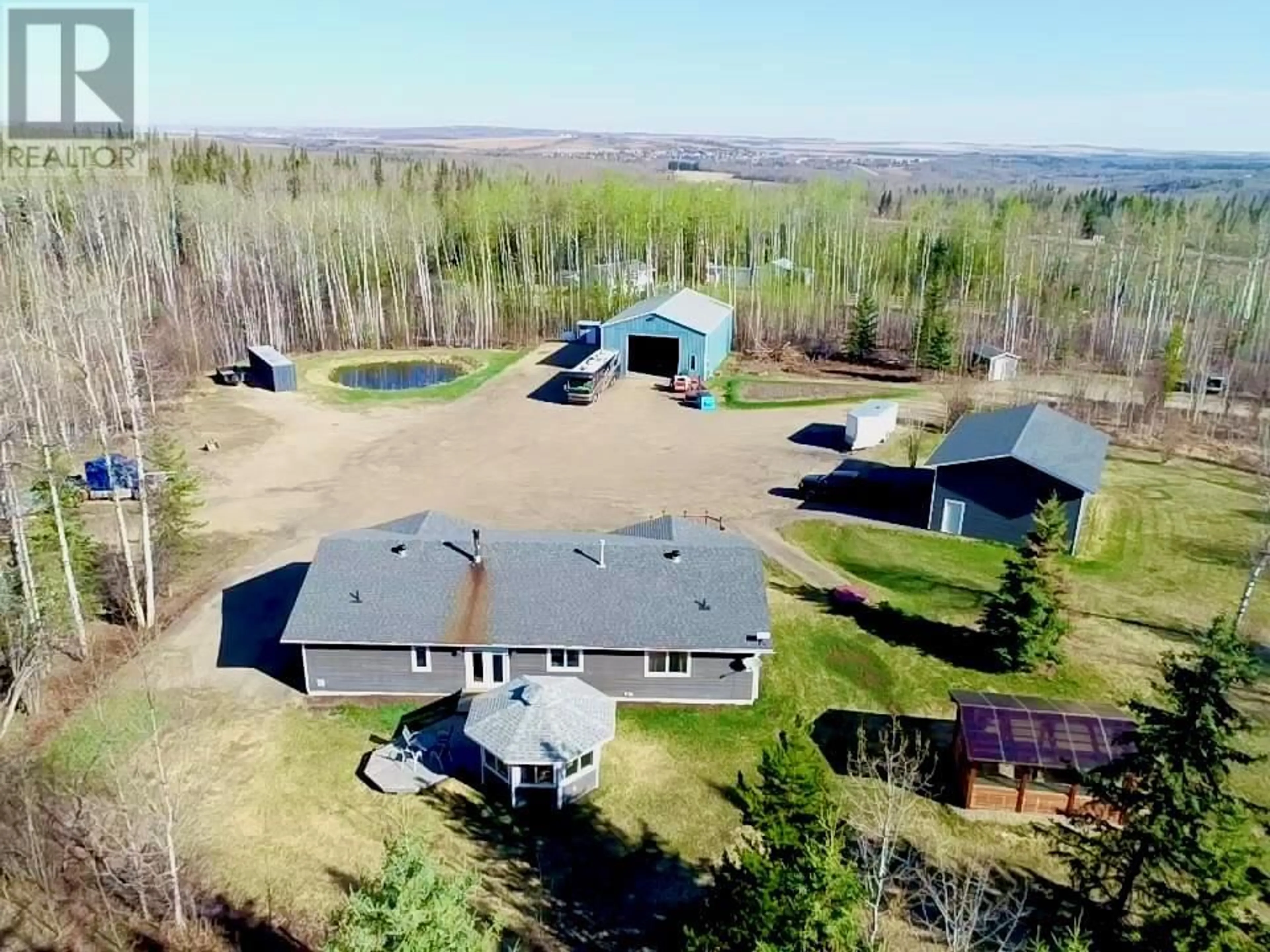 A pic from outside/outdoor area/front of a property/back of a property/a pic from drone, unknown for 13587 PAINCHAUD OTHER, Pouce Coupe British Columbia V0C2C0