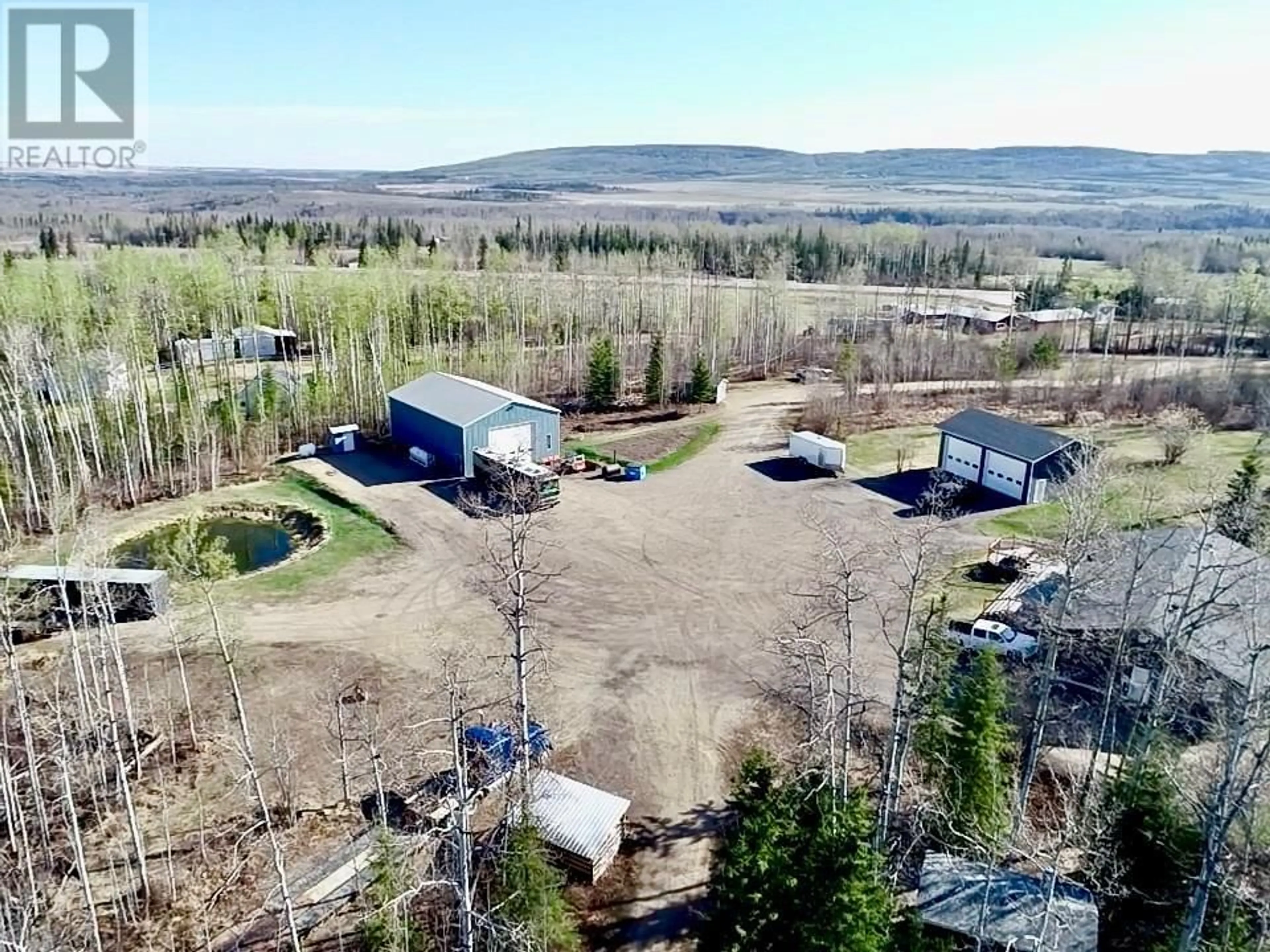 A pic from outside/outdoor area/front of a property/back of a property/a pic from drone, mountain view for 13587 PAINCHAUD OTHER, Pouce Coupe British Columbia V0C2C0