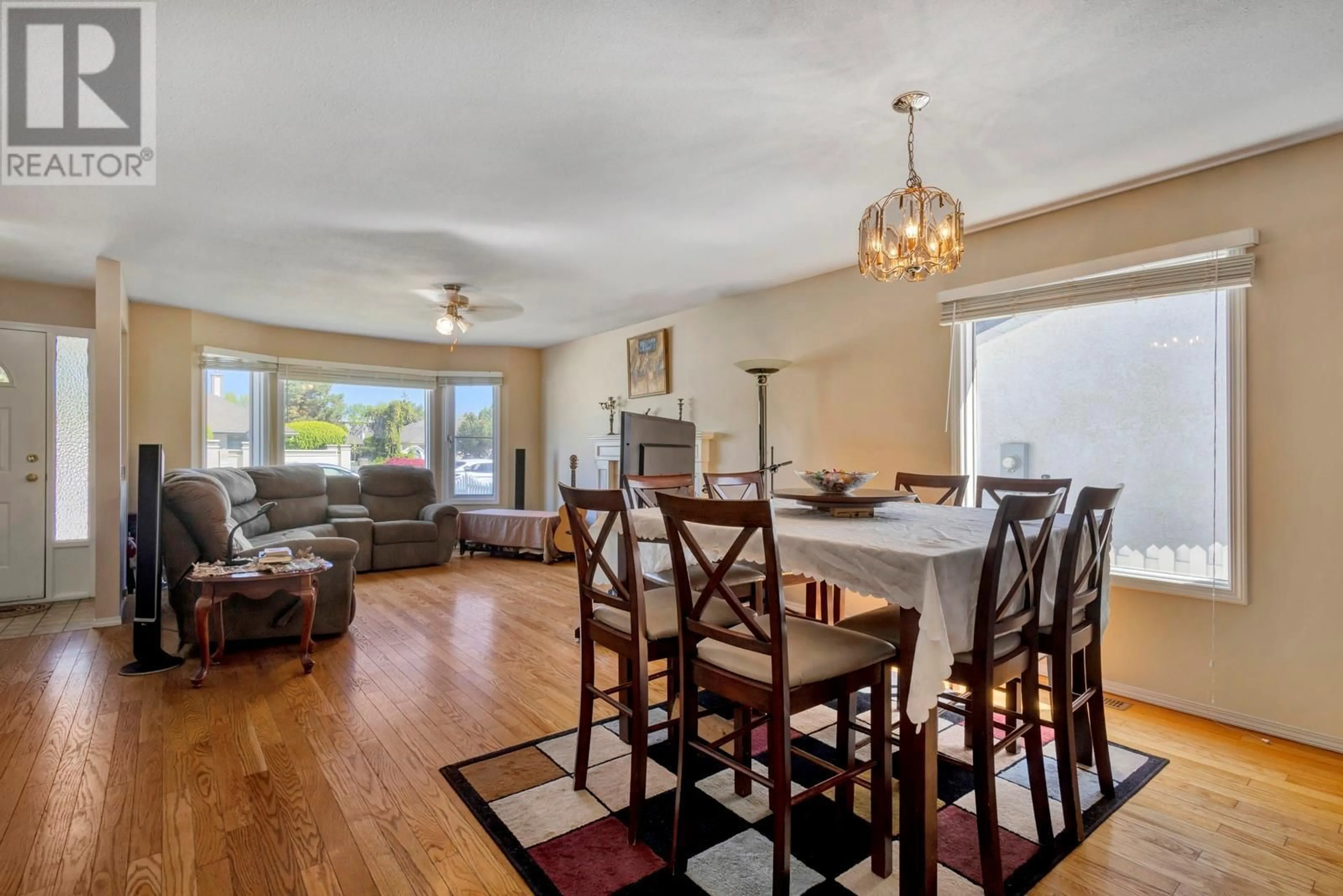 Dining room, wood/laminate floor for 919 LANFRANCO ROAD, Kelowna British Columbia V1W3X2