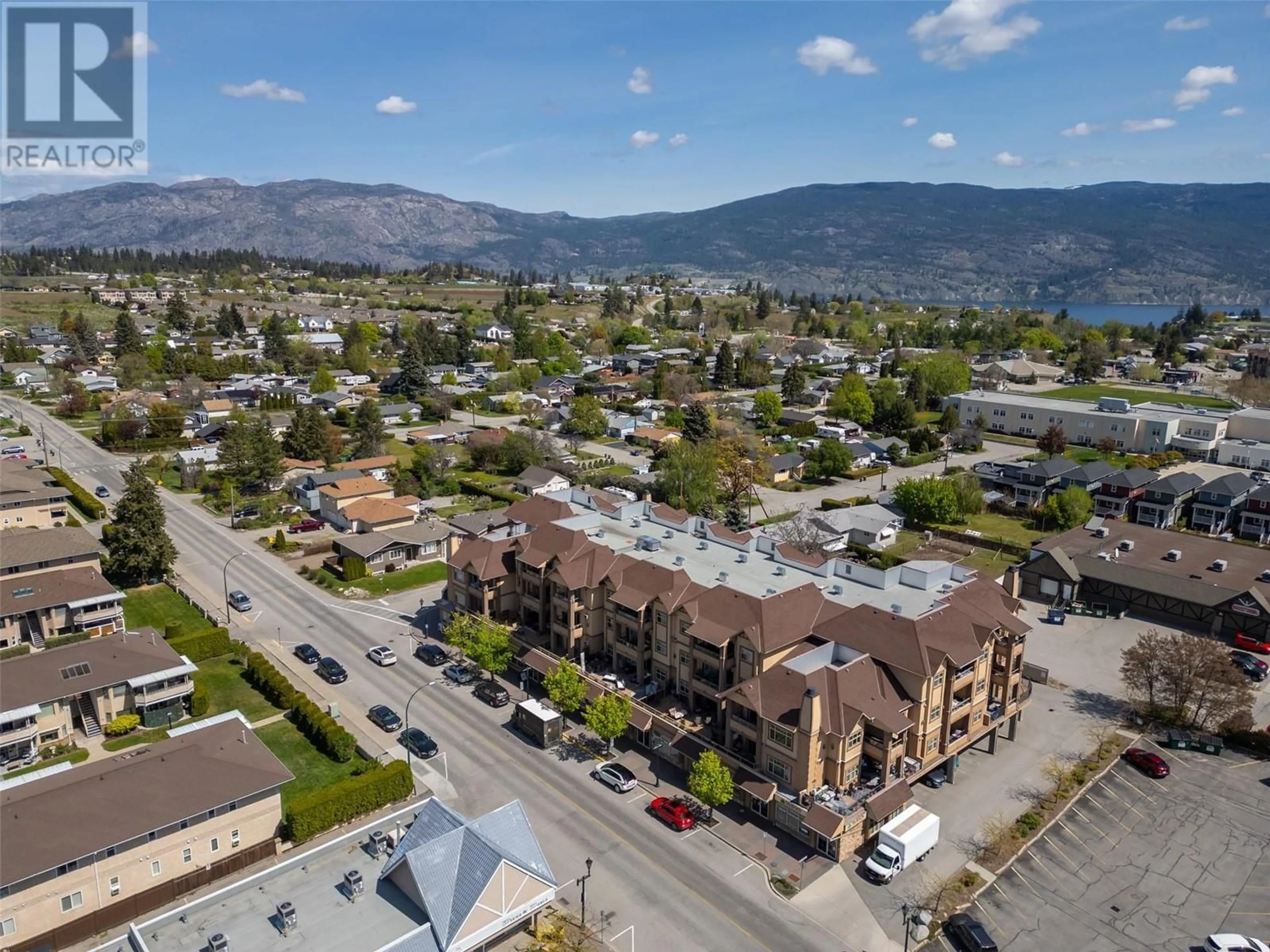 A pic from outside/outdoor area/front of a property/back of a property/a pic from drone, mountain view for 401 - 13615 VICTORIA ROAD NORTH, Summerland British Columbia V0H1Z5