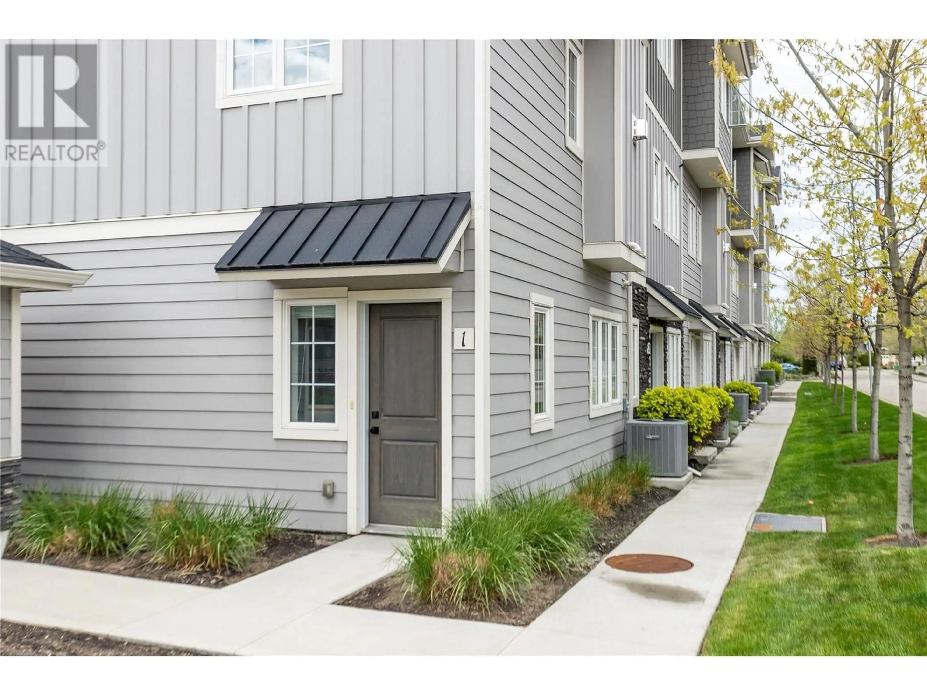 Home with vinyl exterior material, street for 1 - 644 LEQUIME ROAD, Kelowna British Columbia V1W1A4