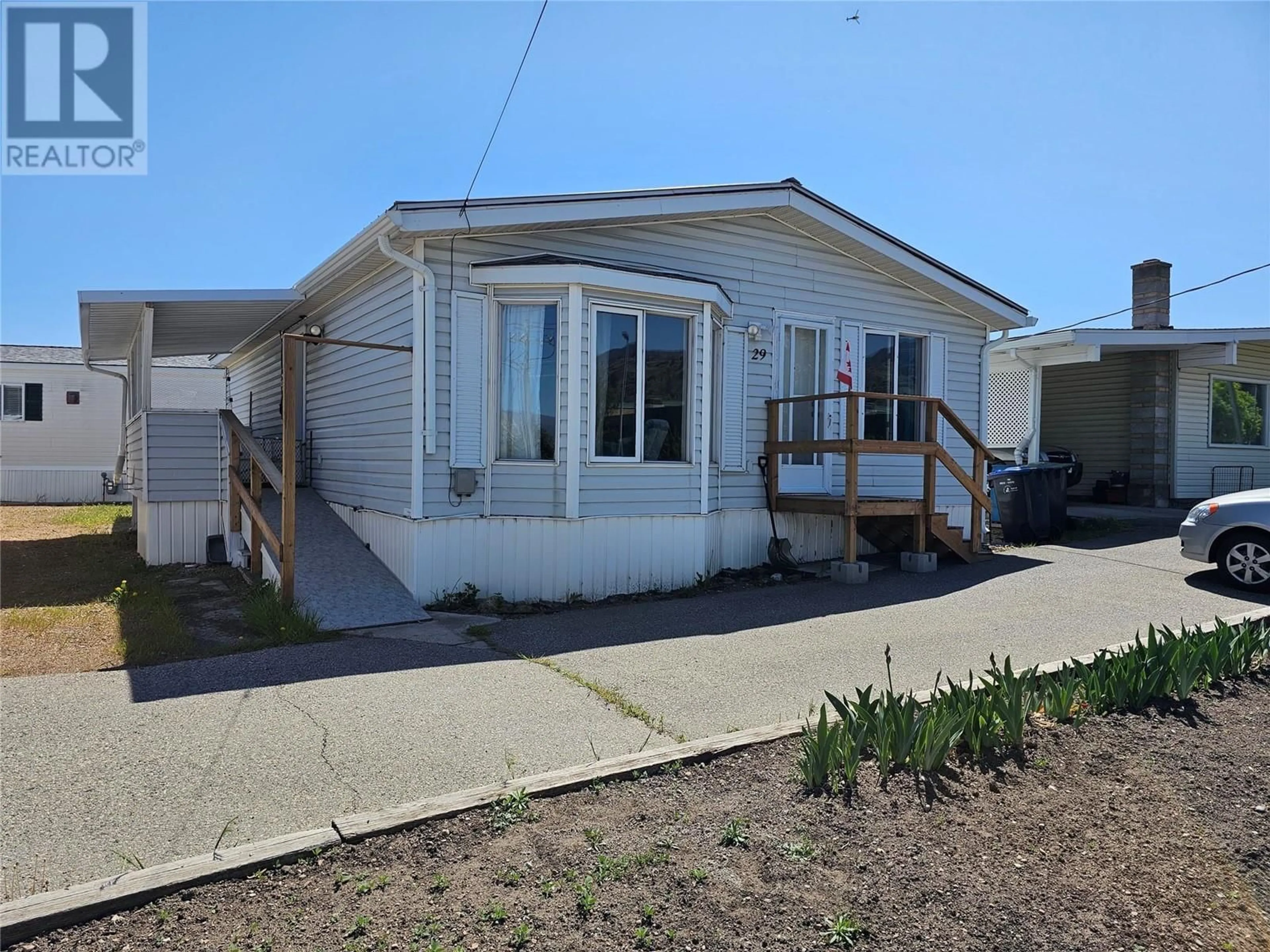 Home with vinyl exterior material, street for 29 - 6677 PARK DRIVE, Oliver British Columbia V0H1T0
