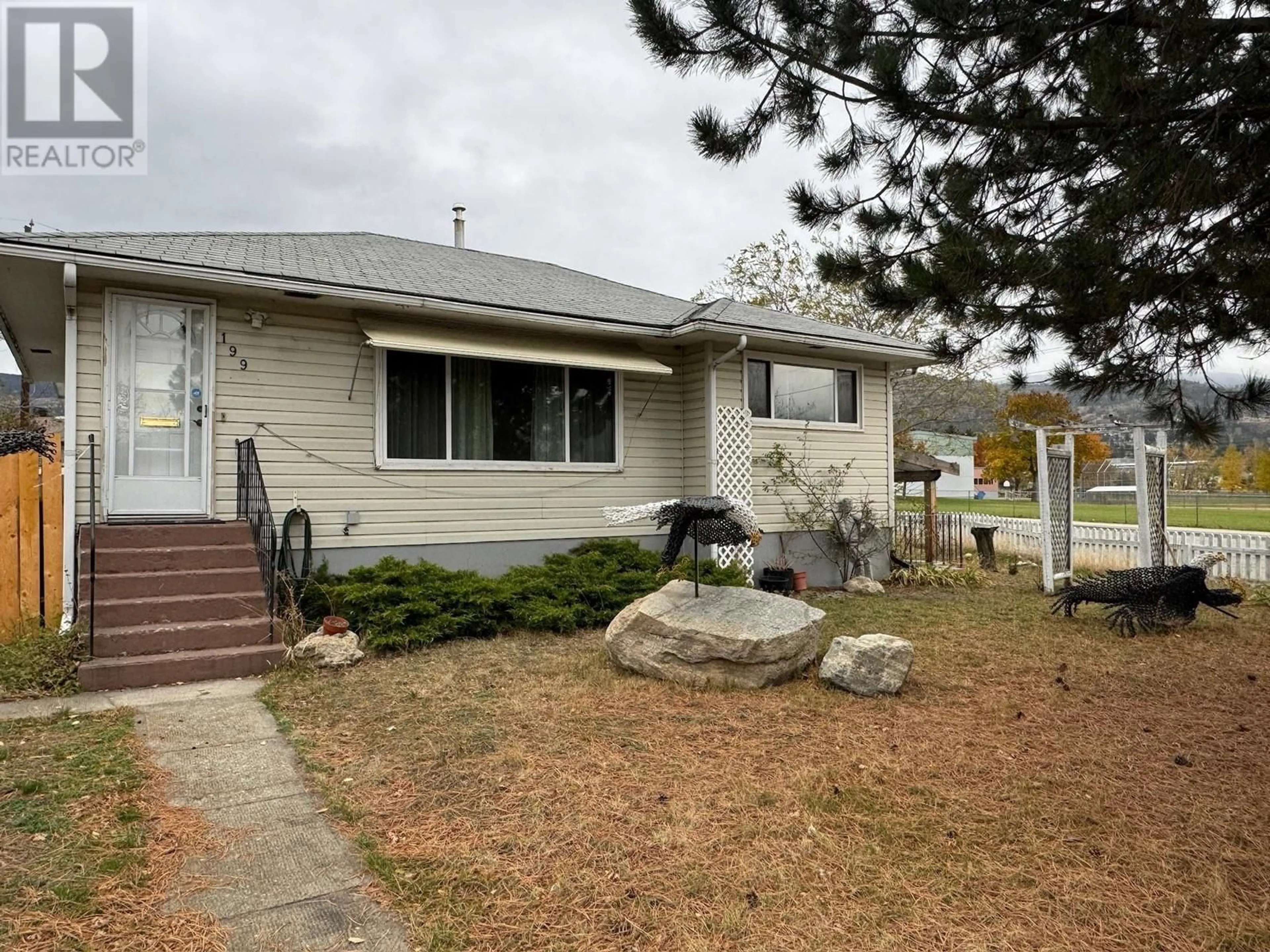 Home with vinyl exterior material, street for 199 WILTON CRESCENT, Penticton British Columbia V2A3A3