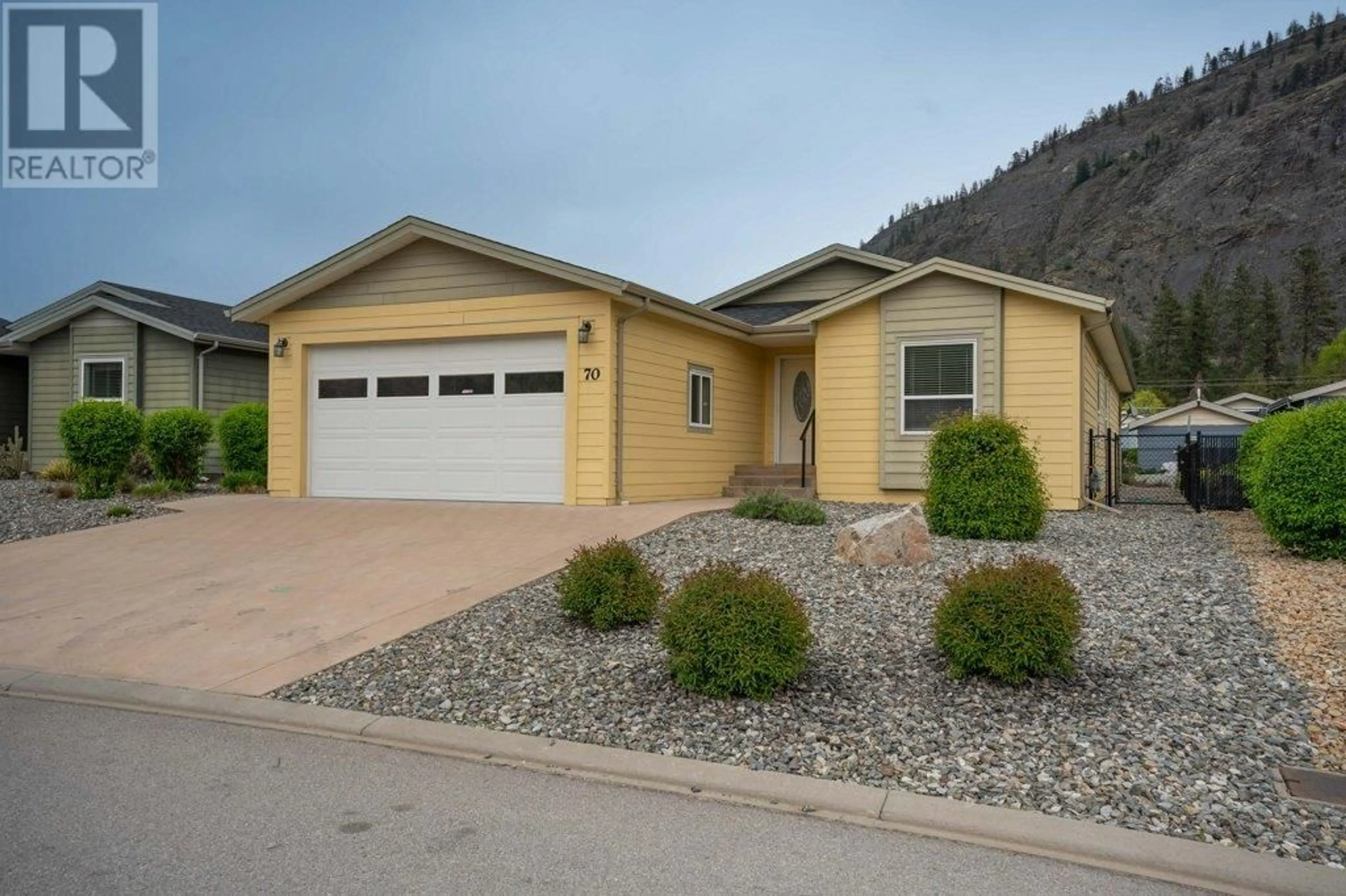 Home with vinyl exterior material, street for 70 - 8300 GALLAGHER LAKE FRONTAGE ROAD, Oliver British Columbia V0H1T0