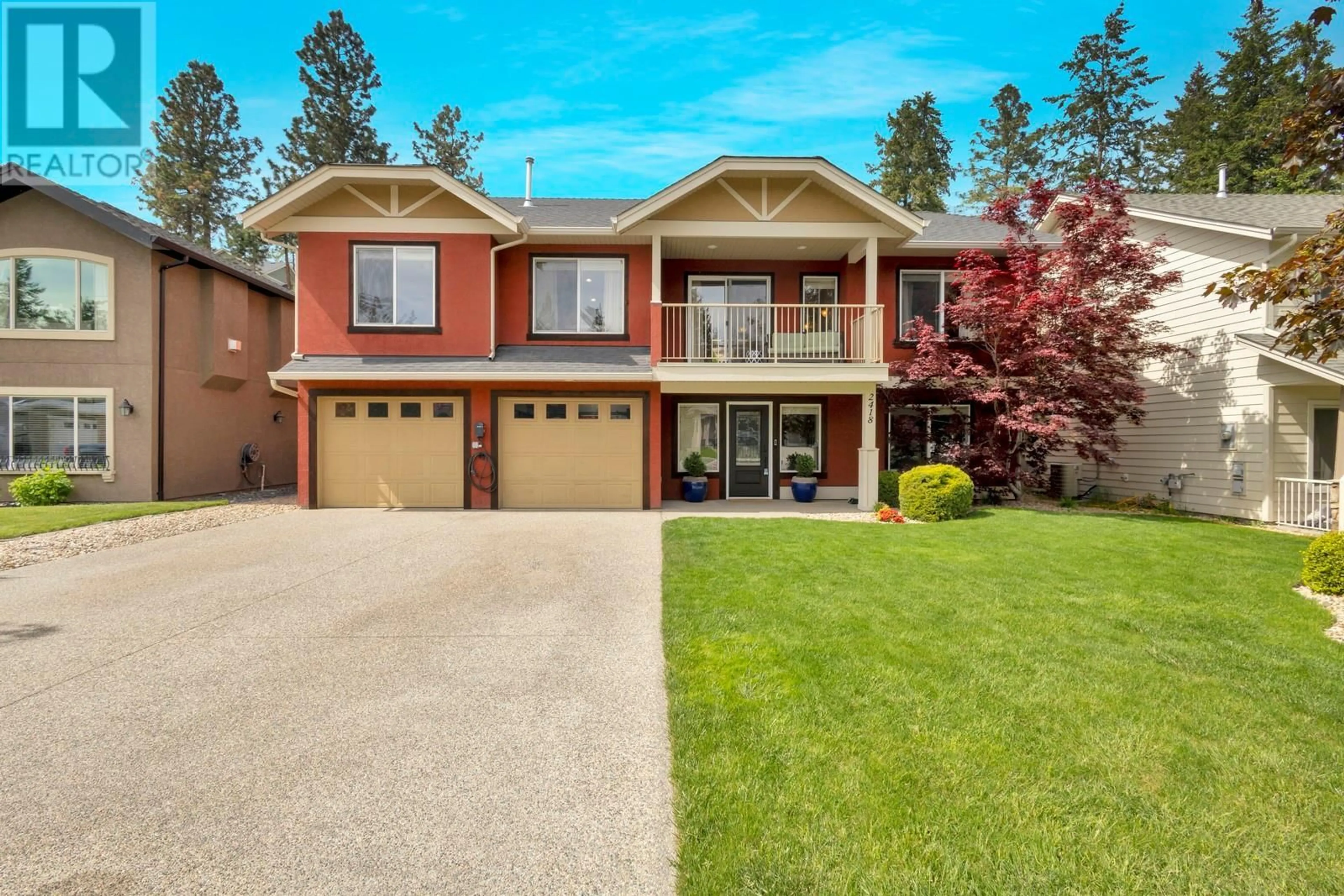 Home with vinyl exterior material, street for 2418 COBBLESTONE ROAD, West Kelowna British Columbia V4T3A7