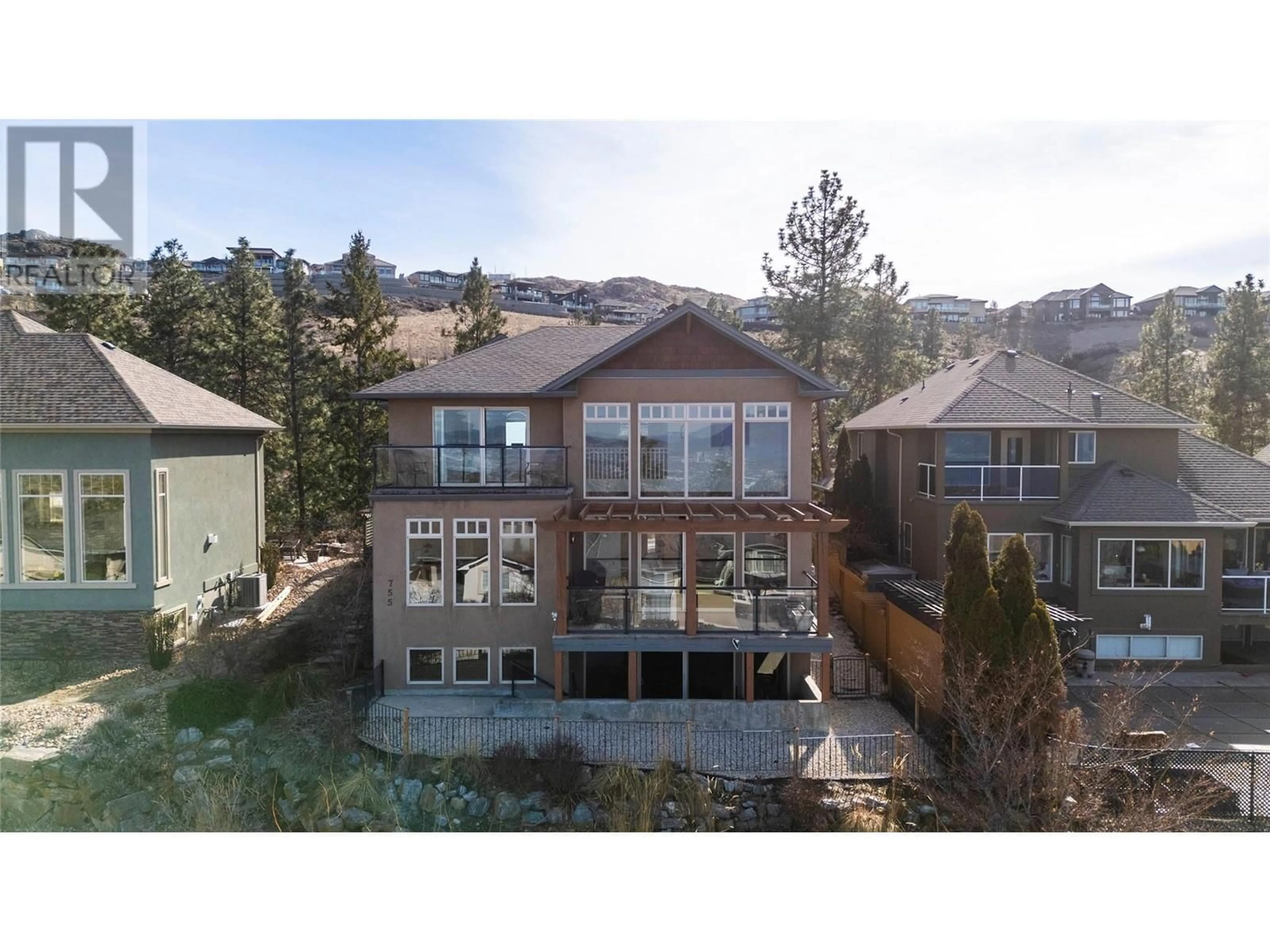 A pic from outside/outdoor area/front of a property/back of a property/a pic from drone, mountain view for 755 SOUTH CREST DRIVE, Kelowna British Columbia V1W4W7