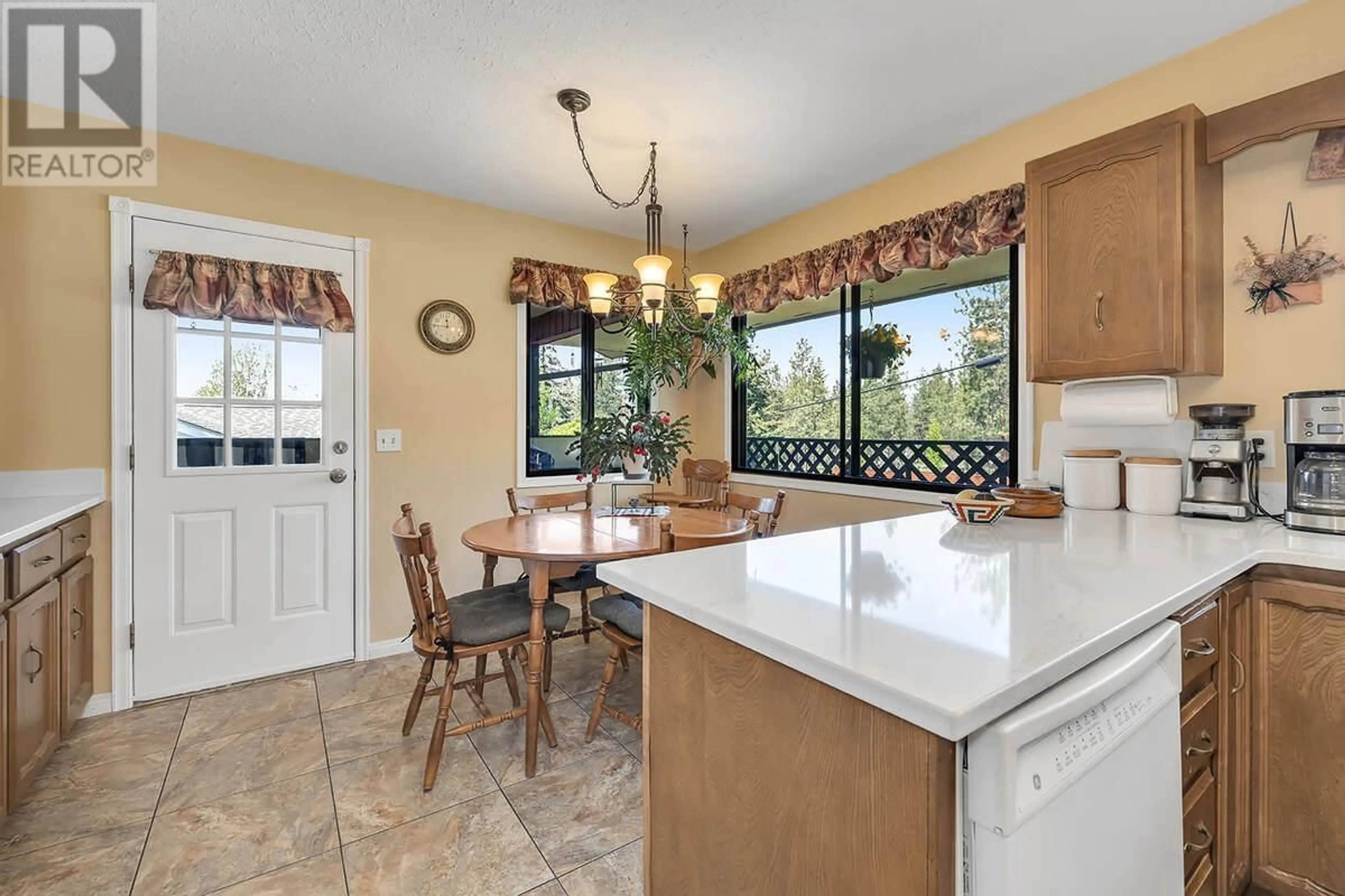 Open concept kitchen, ceramic/tile floor for 655 BARNABY ROAD, Kelowna British Columbia V1W4N8