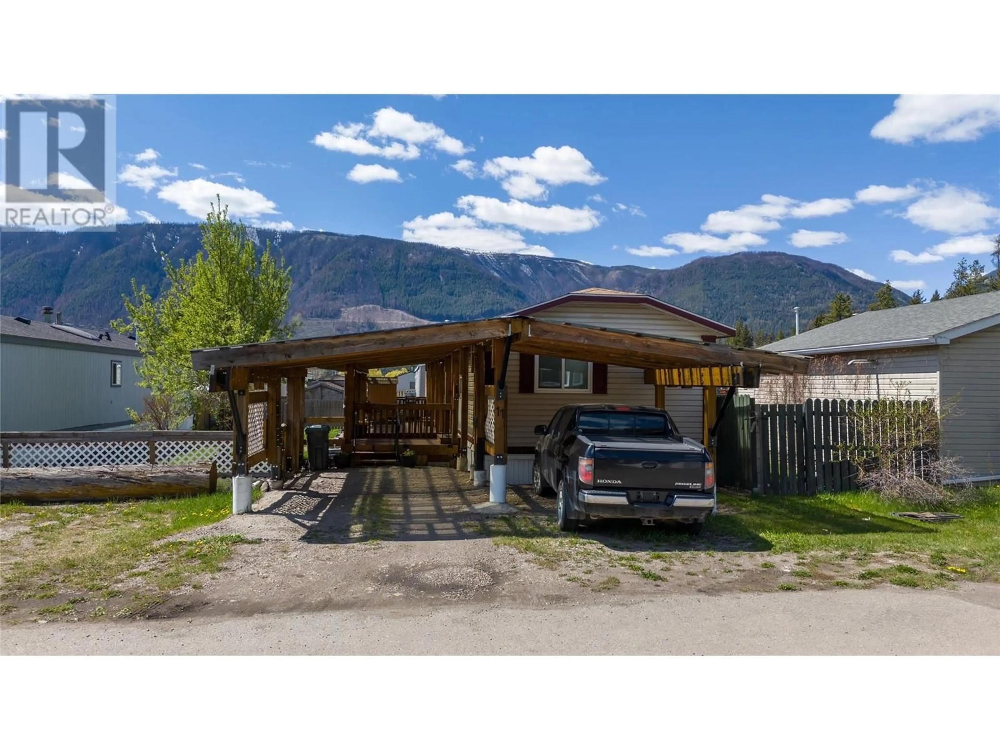 A pic from outside/outdoor area/front of a property/back of a property/a pic from drone, mountain view for 11 - 100 INDUSTRIAL #1 ROAD, Sparwood British Columbia V0B2G1