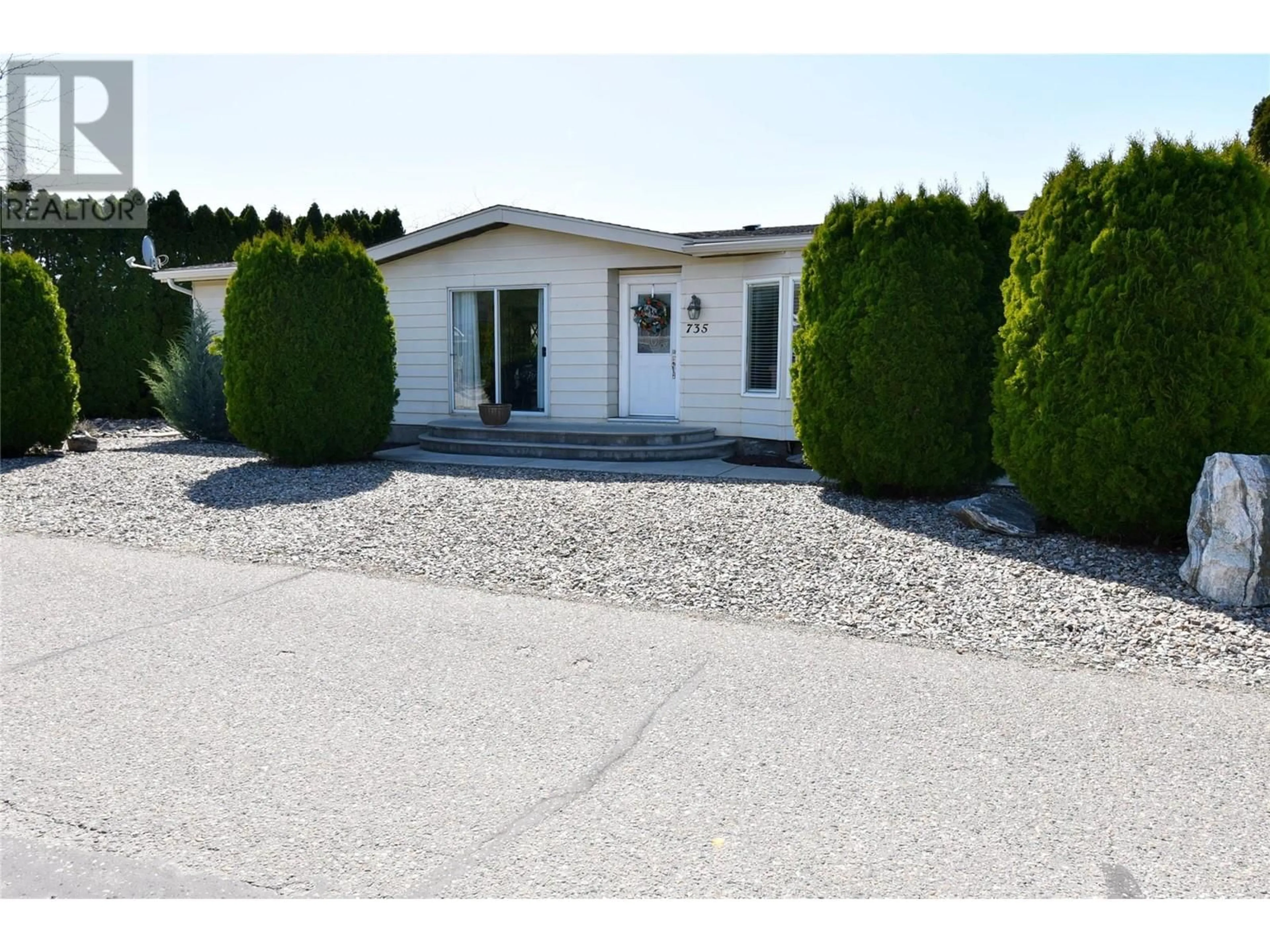 Home with vinyl exterior material, street for 735 3 STREET, Vernon British Columbia V1H1Z1