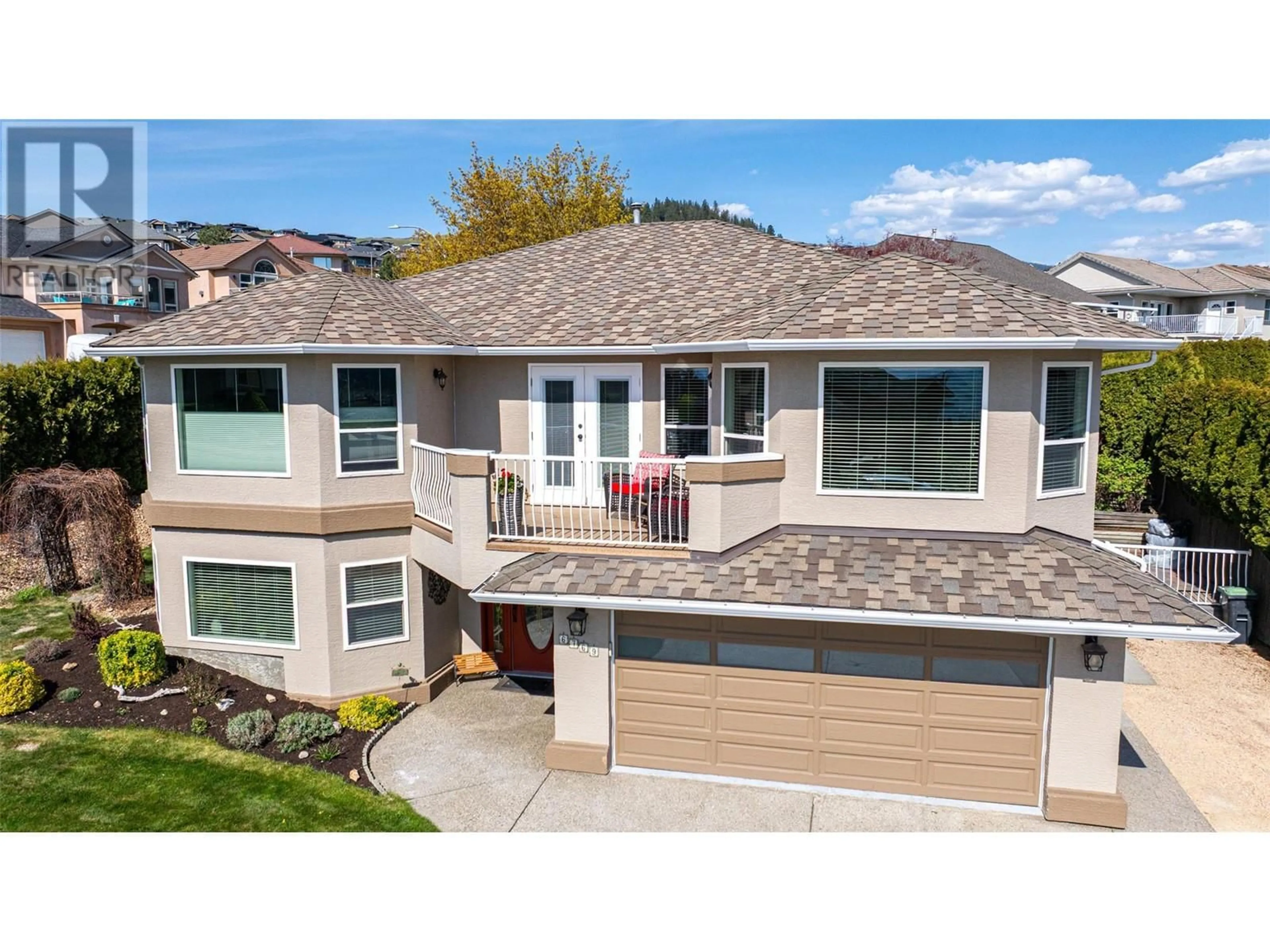 Home with vinyl exterior material, mountain view for 6769 FOOTHILLS DRIVE, Vernon British Columbia V1B2Y3