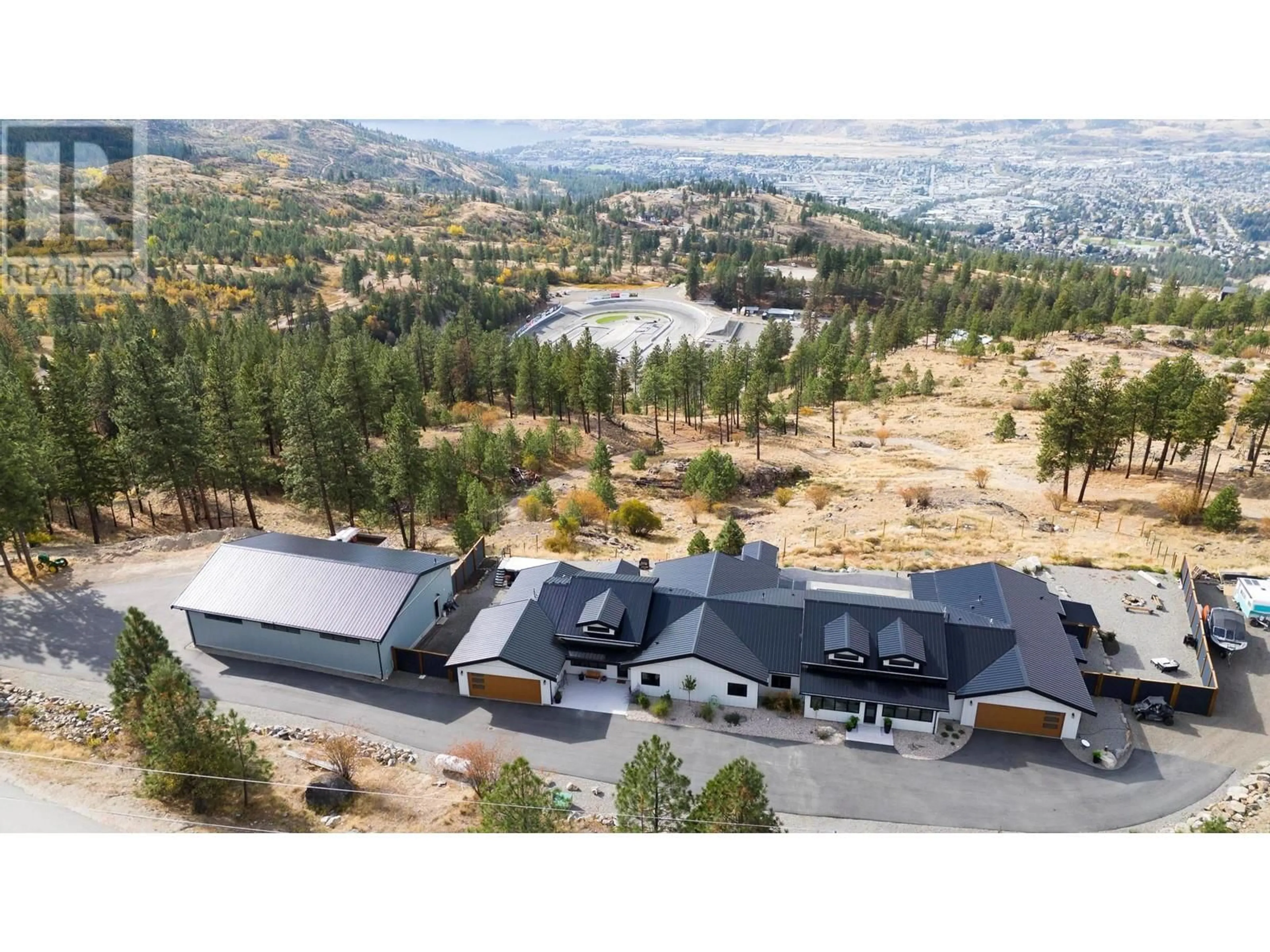 A pic from outside/outdoor area/front of a property/back of a property/a pic from drone, mountain view for 2137 CARMI ROAD, Penticton British Columbia V2A8V5