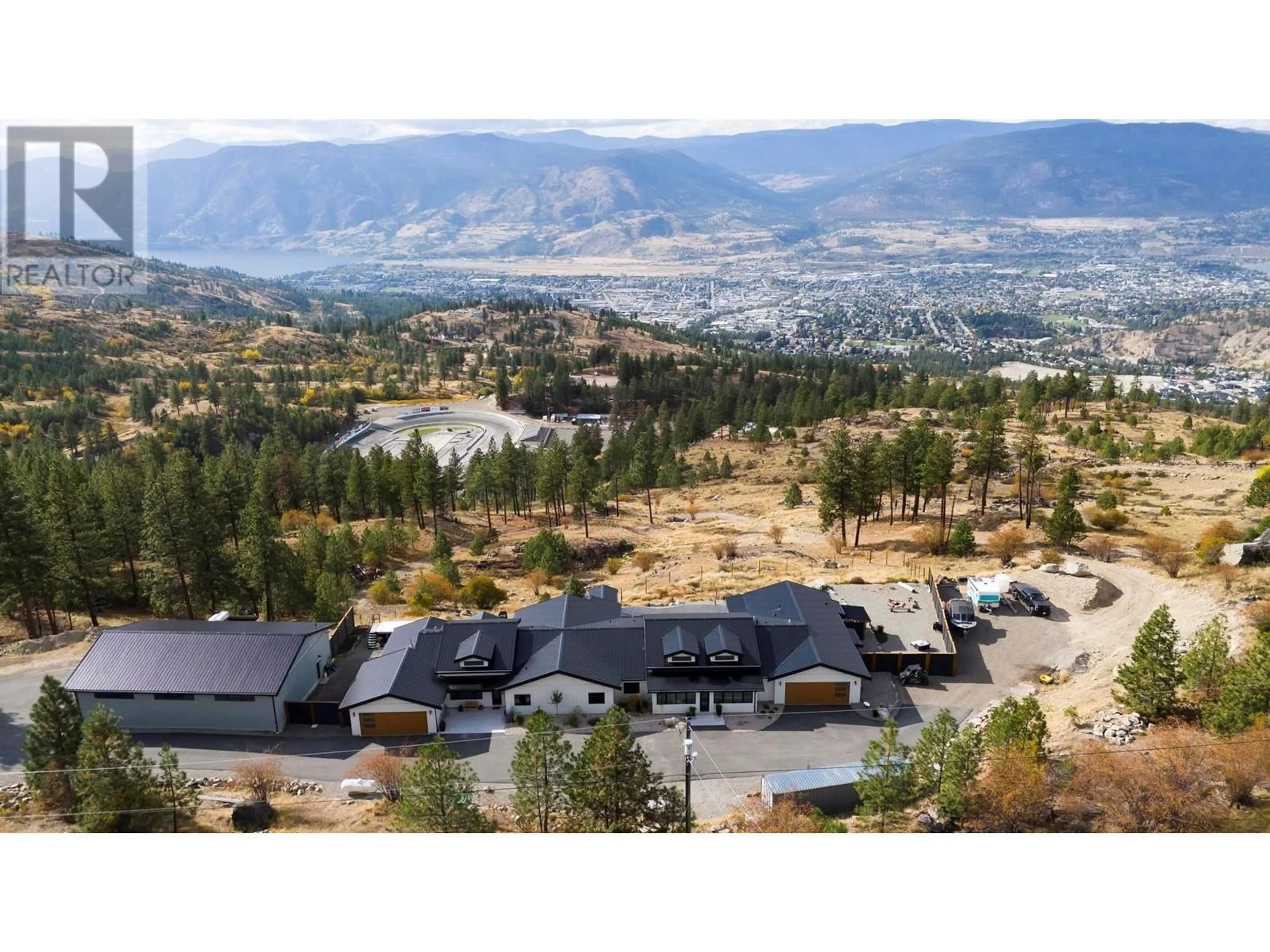 A pic from outside/outdoor area/front of a property/back of a property/a pic from drone, mountain view for 2137 CARMI ROAD, Penticton British Columbia V2A8V5