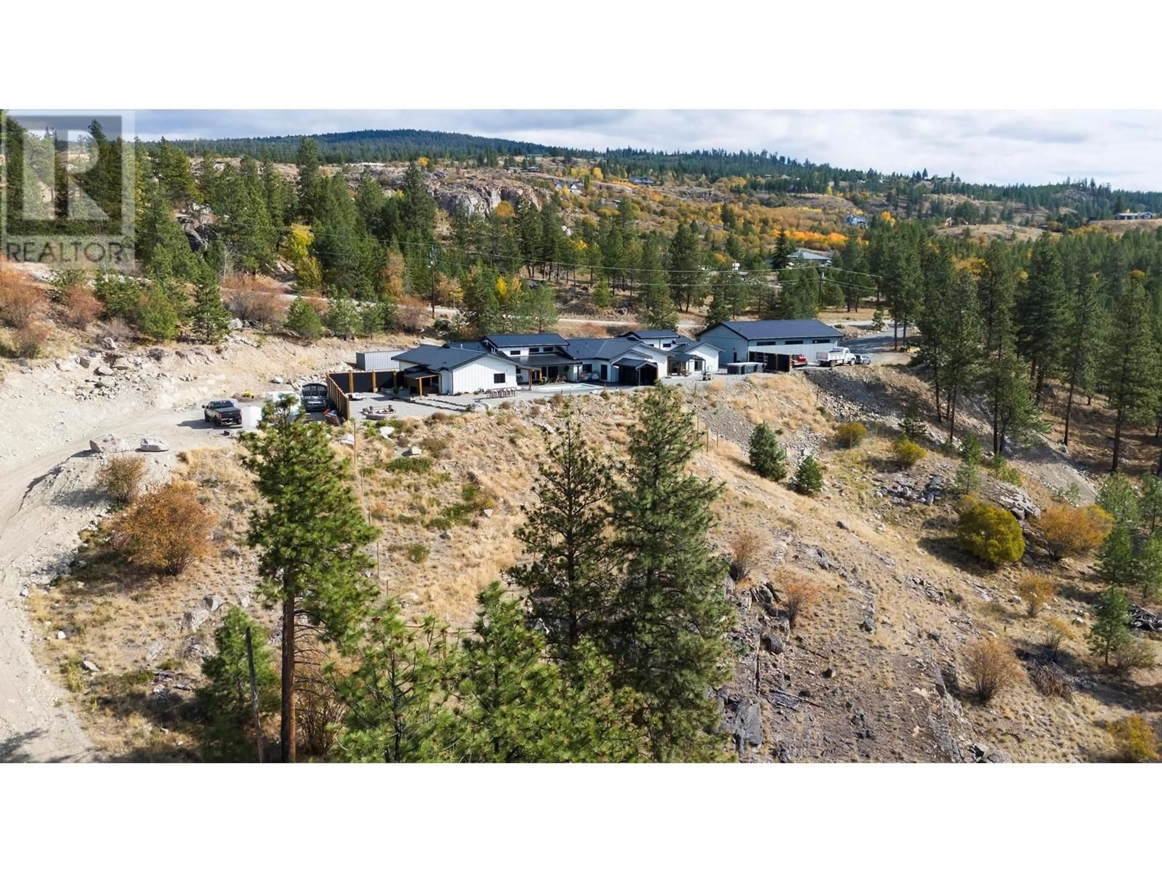 A pic from outside/outdoor area/front of a property/back of a property/a pic from drone, mountain view for 2137 CARMI ROAD, Penticton British Columbia V2A8V5