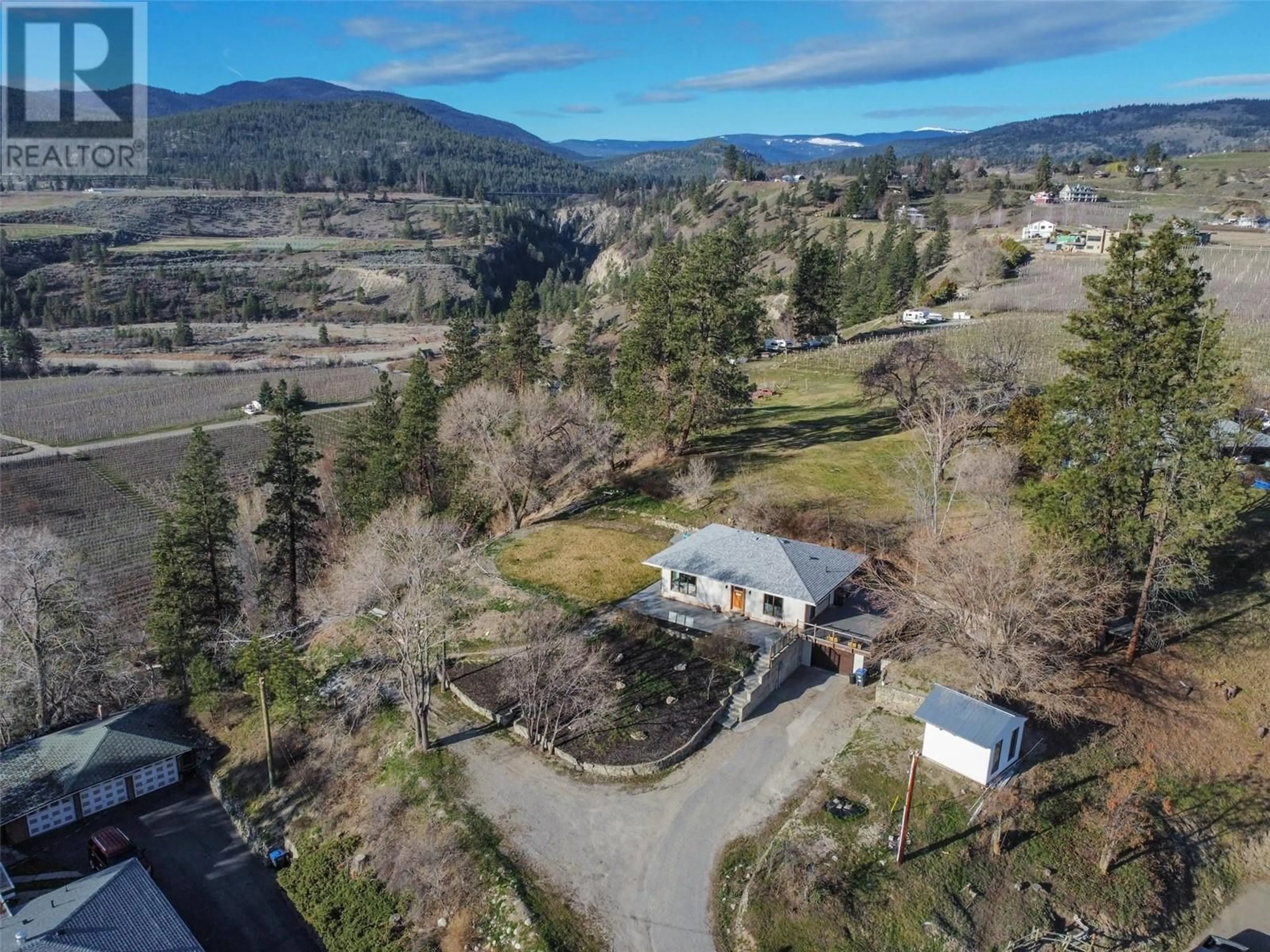 A pic from outside/outdoor area/front of a property/back of a property/a pic from drone, mountain view for 3909 GARTRELL ROAD, Summerland British Columbia V0H1Z4