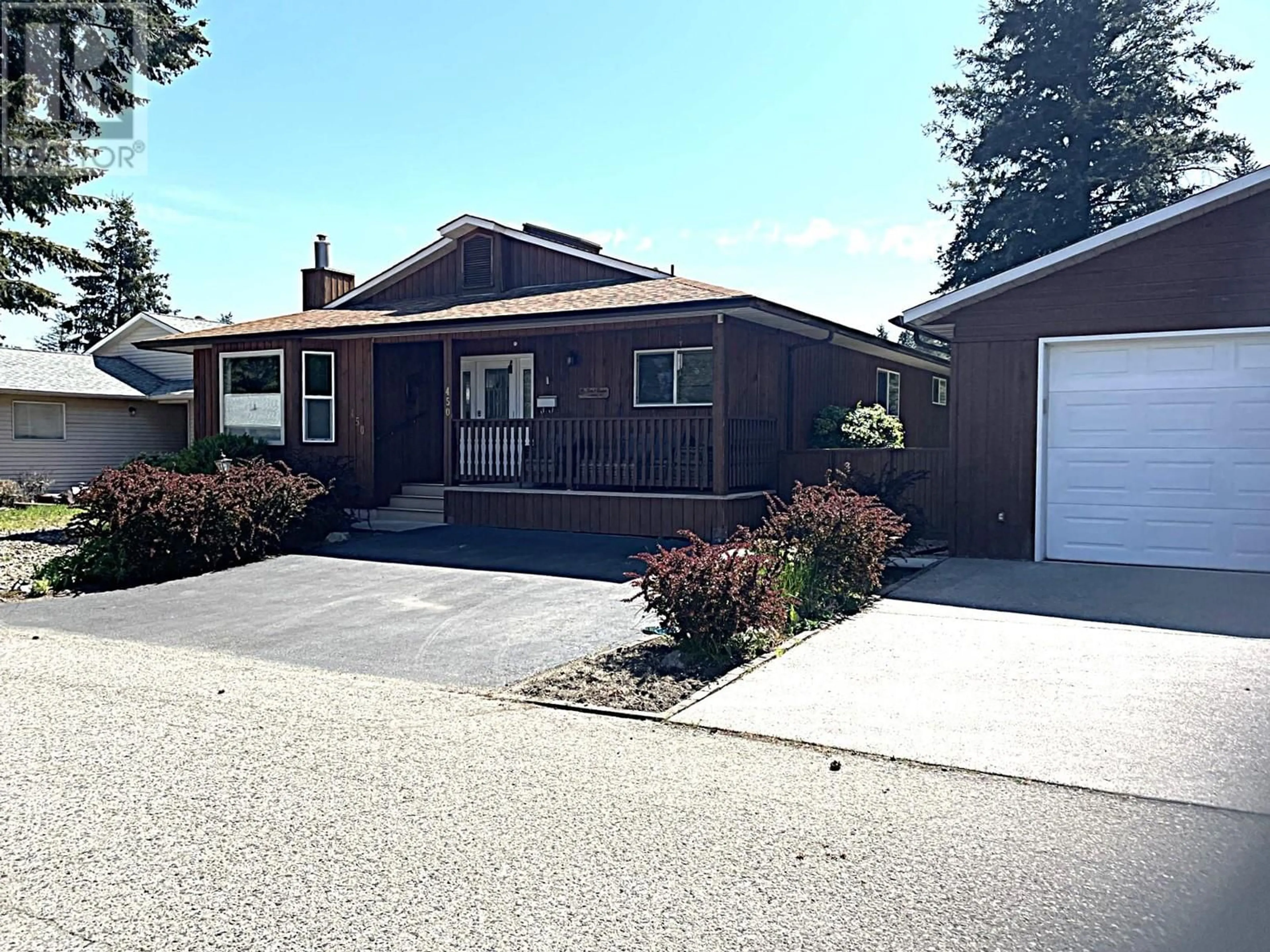Home with vinyl exterior material, street for 450 IBIS AVENUE, Vernon British Columbia V1H2A1