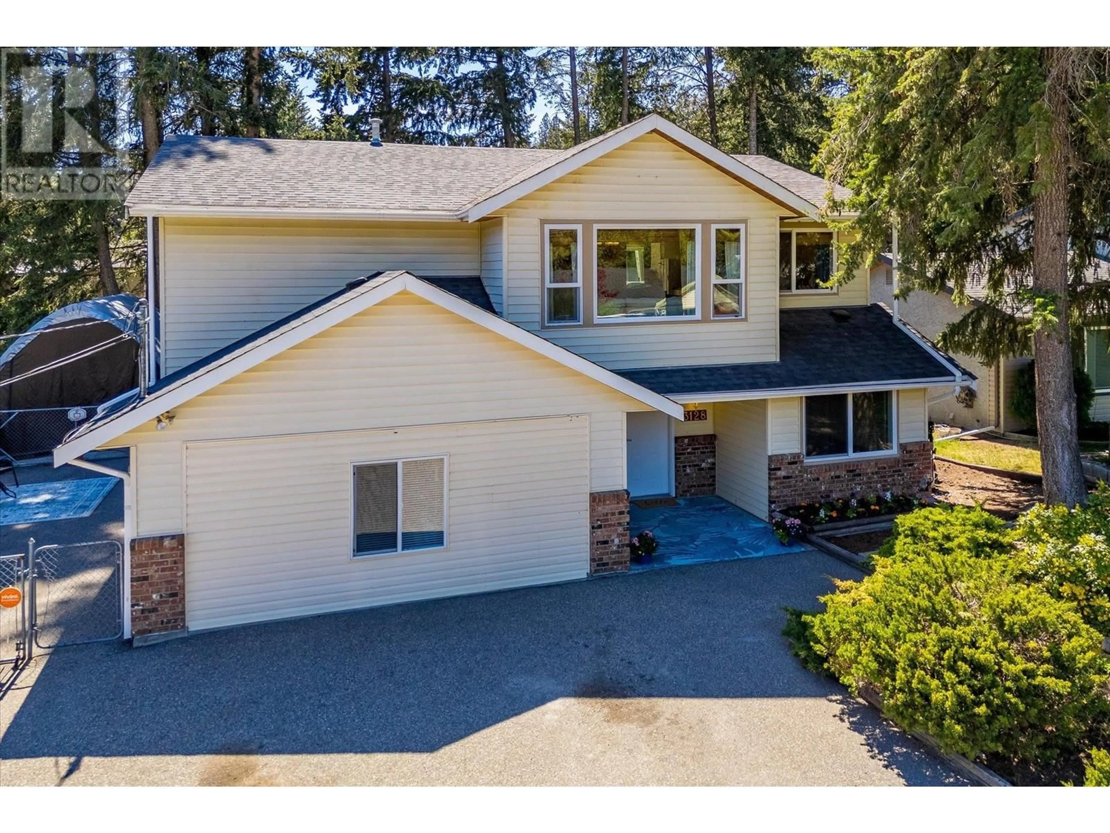 A pic from outside/outdoor area/front of a property/back of a property/a pic from drone, street for 3128 COVENTRY CRESCENT, West Kelowna British Columbia V4T1E8