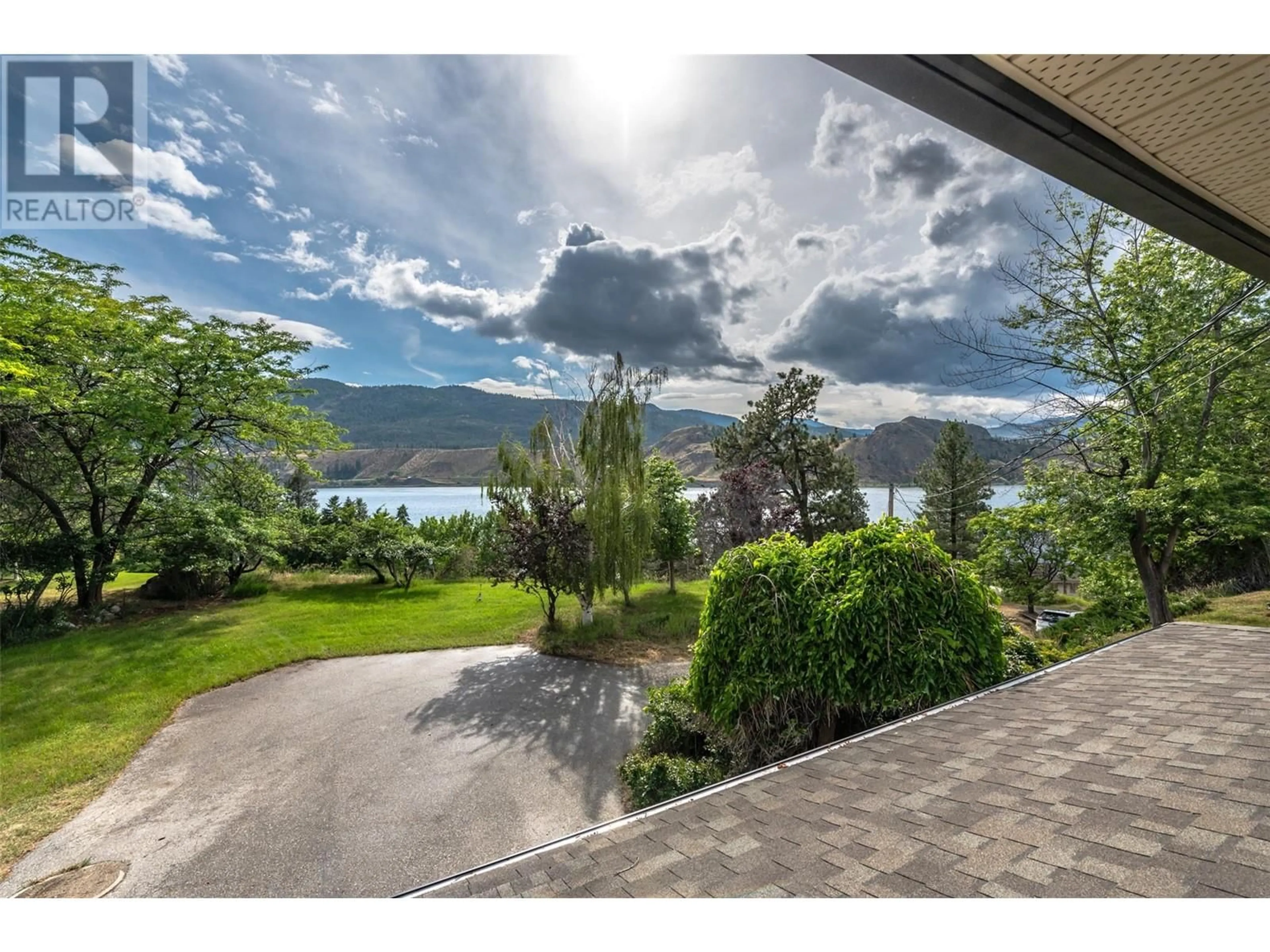 A pic from outside/outdoor area/front of a property/back of a property/a pic from drone, water/lake/river/ocean view for 331 EASTSIDE ROAD, Okanagan Falls British Columbia V0H1R5