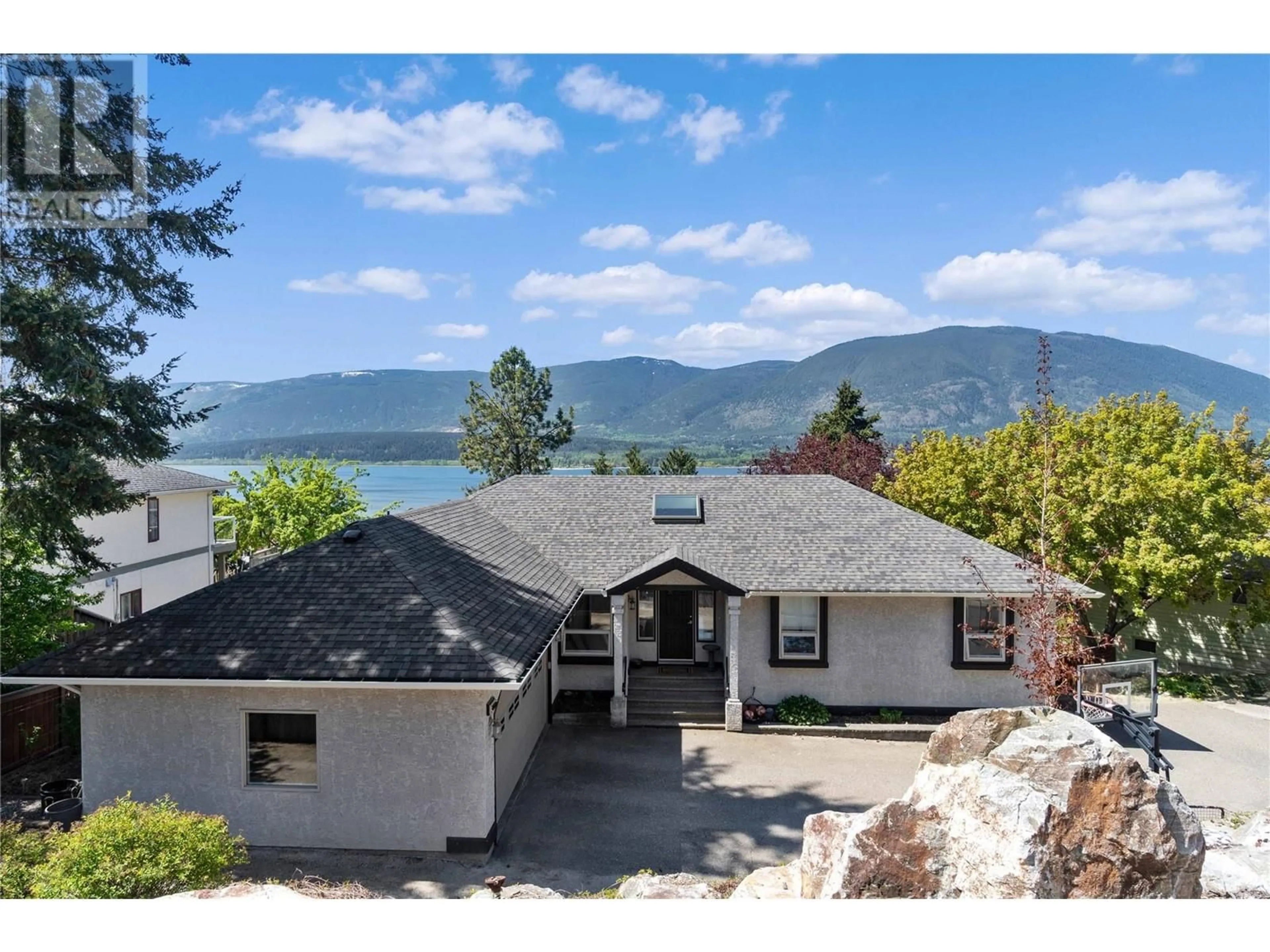 A pic from outside/outdoor area/front of a property/back of a property/a pic from drone, water/lake/river/ocean view for 4771 16 STREET NORTHEAST, Salmon Arm British Columbia V1E1E1