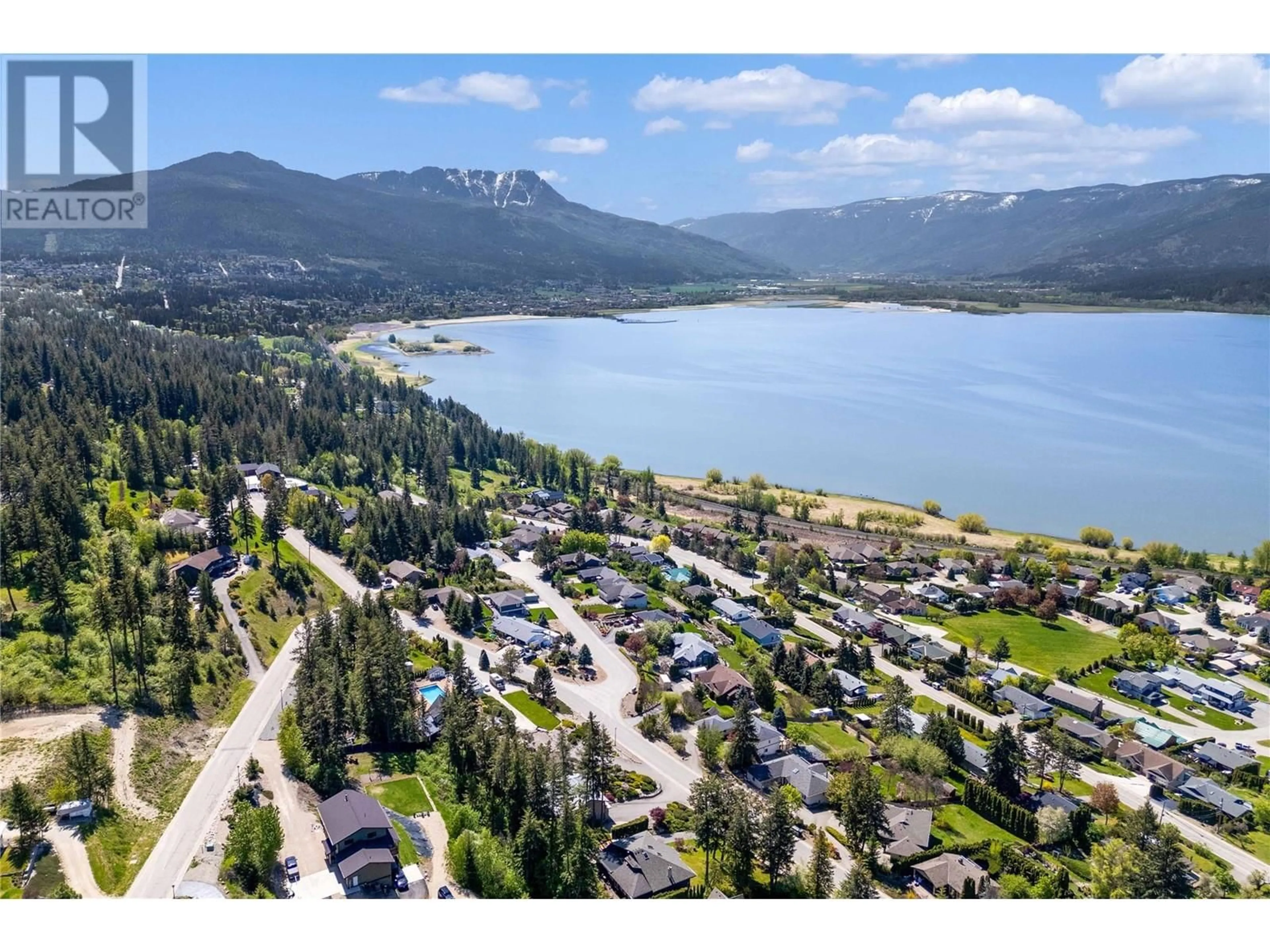 A pic from outside/outdoor area/front of a property/back of a property/a pic from drone, water/lake/river/ocean view for 4771 16 STREET NORTHEAST, Salmon Arm British Columbia V1E1E1