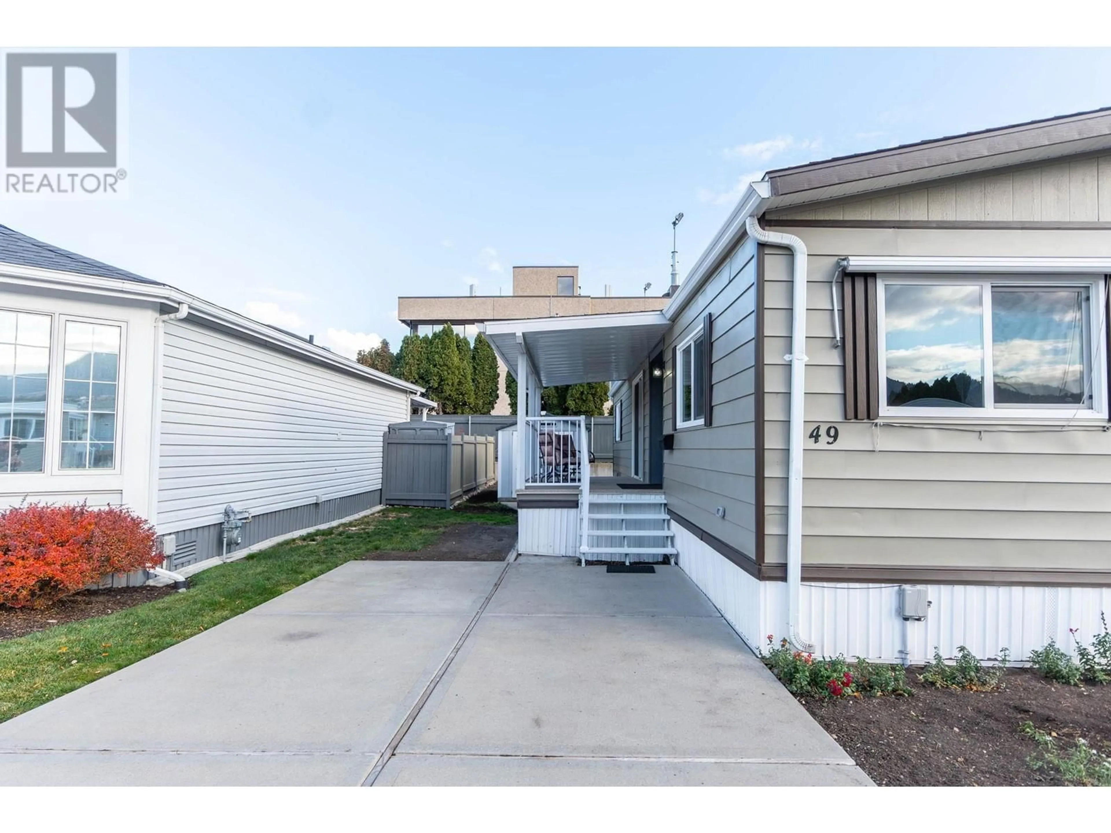 Home with vinyl exterior material, street for 49 - 999 BURNABY AVENUE, Penticton British Columbia V2A1G7
