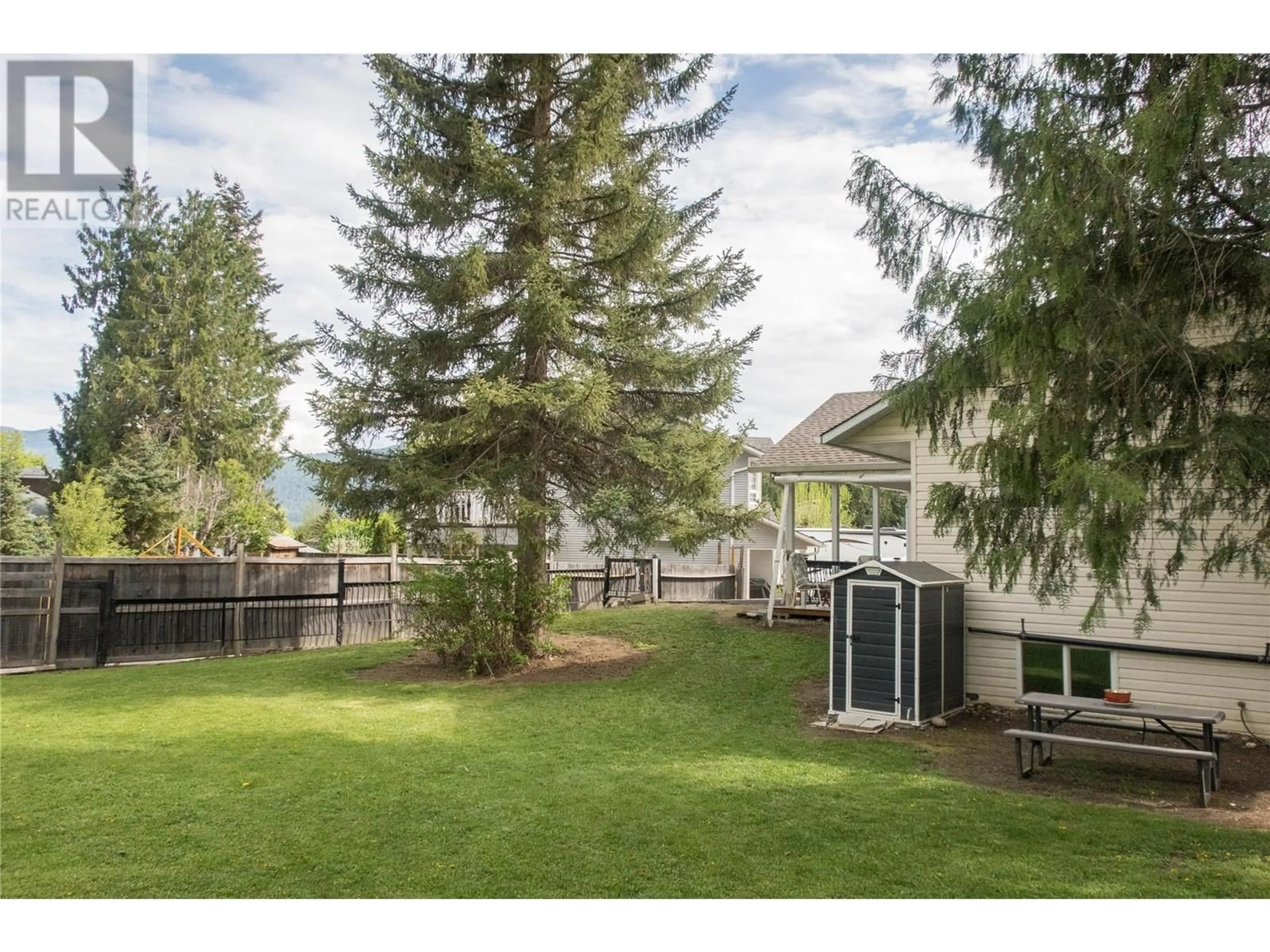 A pic from outside/outdoor area/front of a property/back of a property/a pic from drone, water/lake/river/ocean view for 2467 SPRUCE AVENUE, Lumby British Columbia V0E2G5