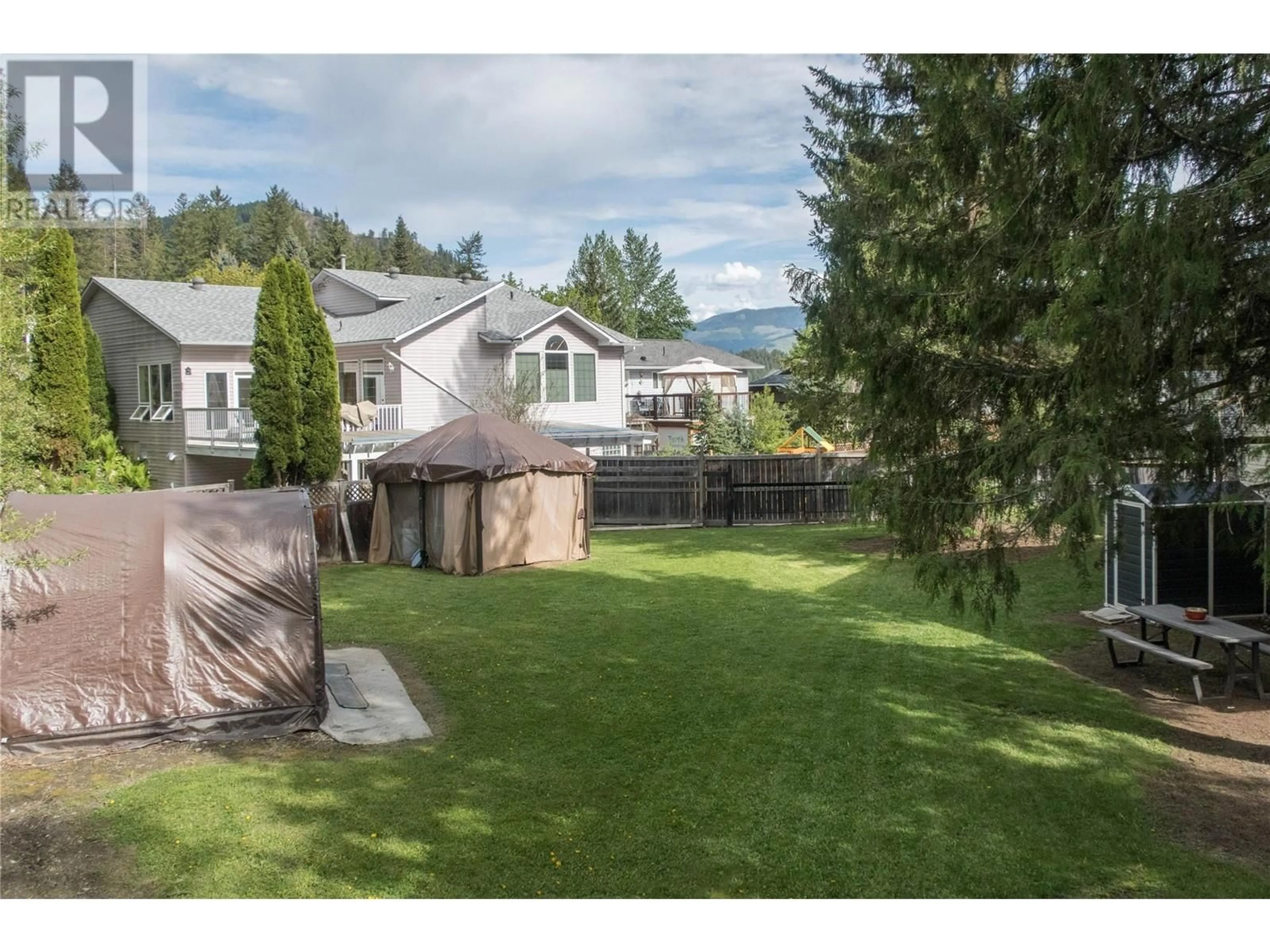 A pic from outside/outdoor area/front of a property/back of a property/a pic from drone, mountain view for 2467 SPRUCE AVENUE, Lumby British Columbia V0E2G5