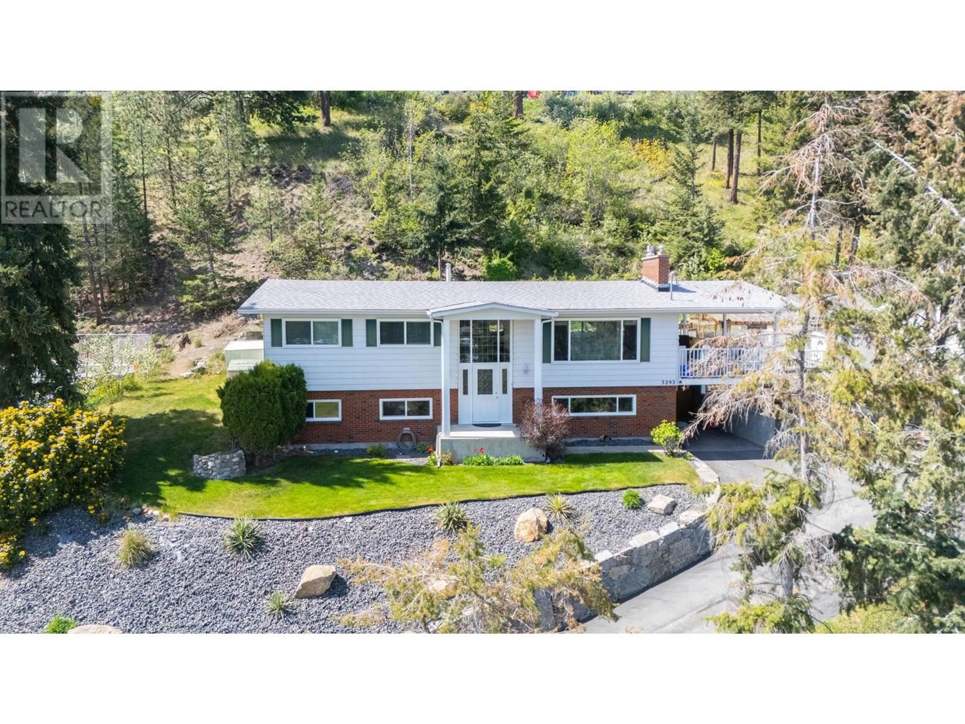 A pic from outside/outdoor area/front of a property/back of a property/a pic from drone, unknown for 3292 MCIVER ROAD, West Kelowna British Columbia V4T1G2