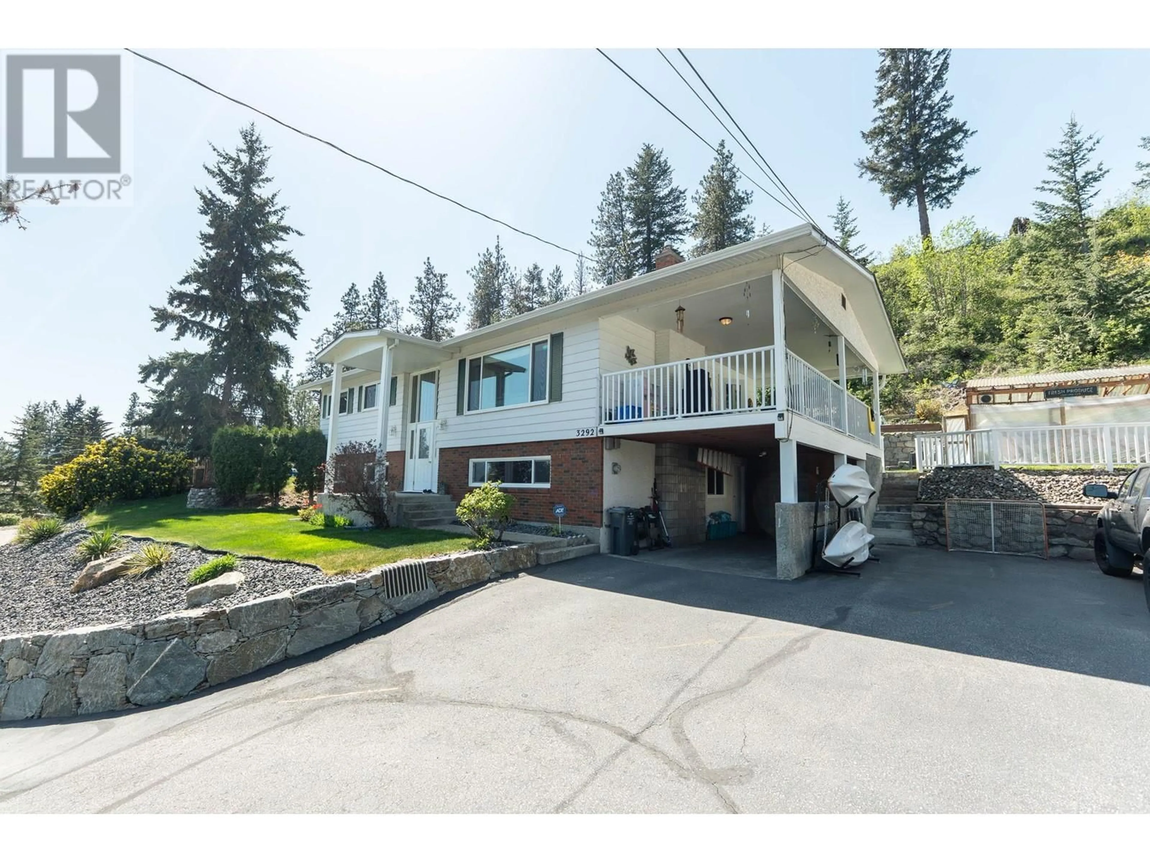 A pic from outside/outdoor area/front of a property/back of a property/a pic from drone, street for 3292 MCIVER ROAD, West Kelowna British Columbia V4T1G2