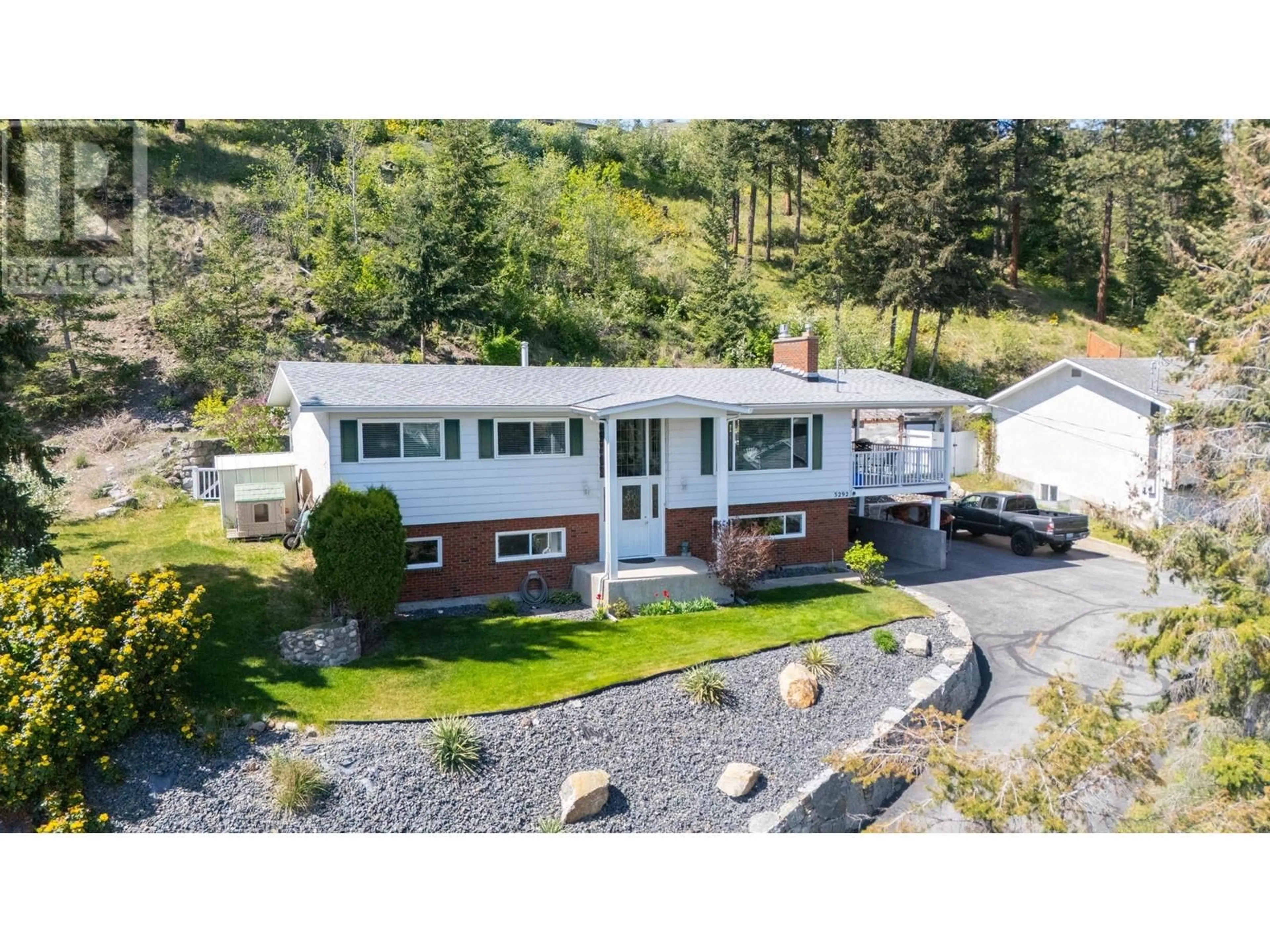 A pic from outside/outdoor area/front of a property/back of a property/a pic from drone, unknown for 3292 MCIVER ROAD, West Kelowna British Columbia V4T1G2