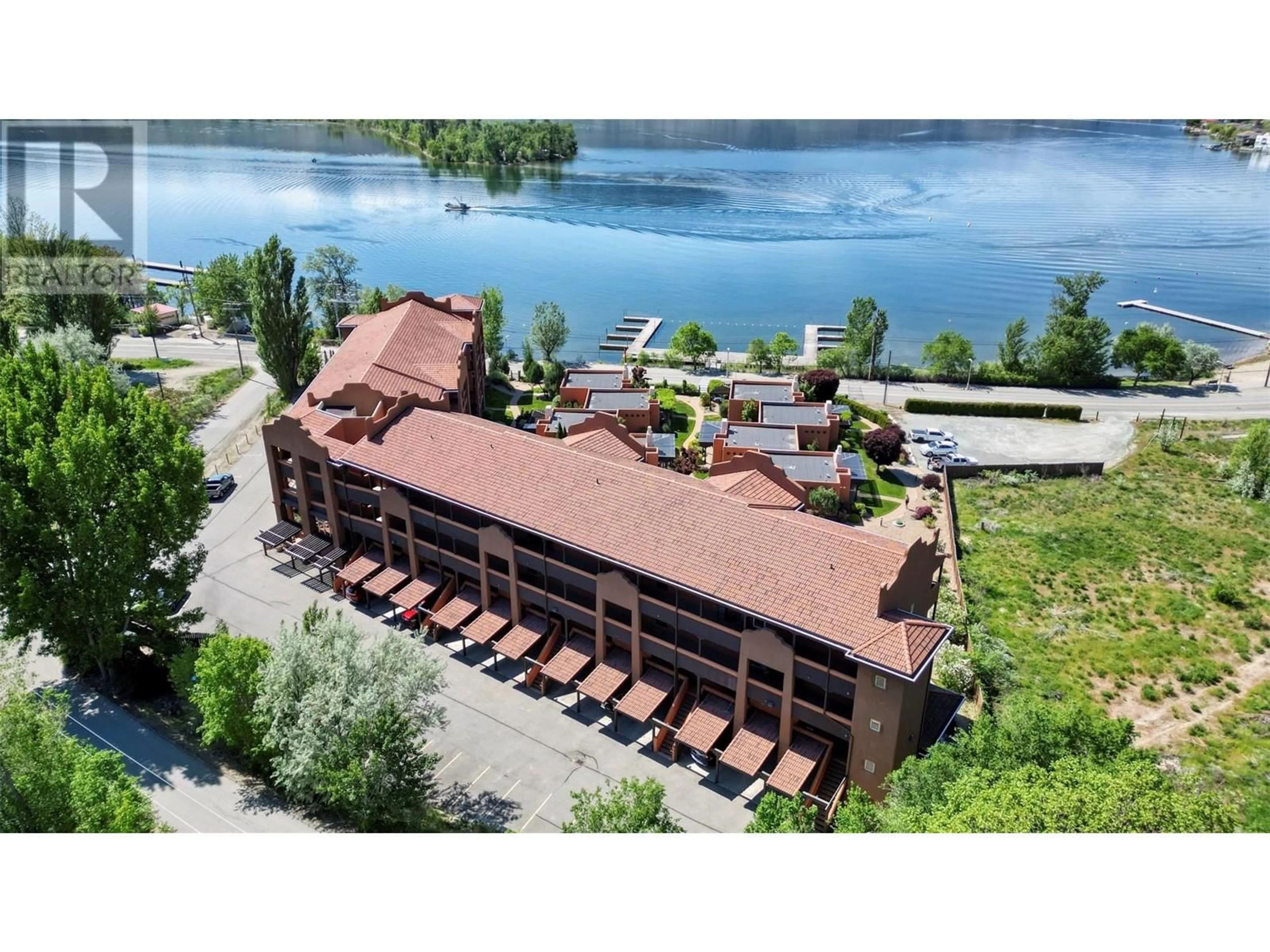 A pic from outside/outdoor area/front of a property/back of a property/a pic from drone, water/lake/river/ocean view for 10 - 4300 44TH AVE. DRIVE, Osoyoos British Columbia V0H1V6