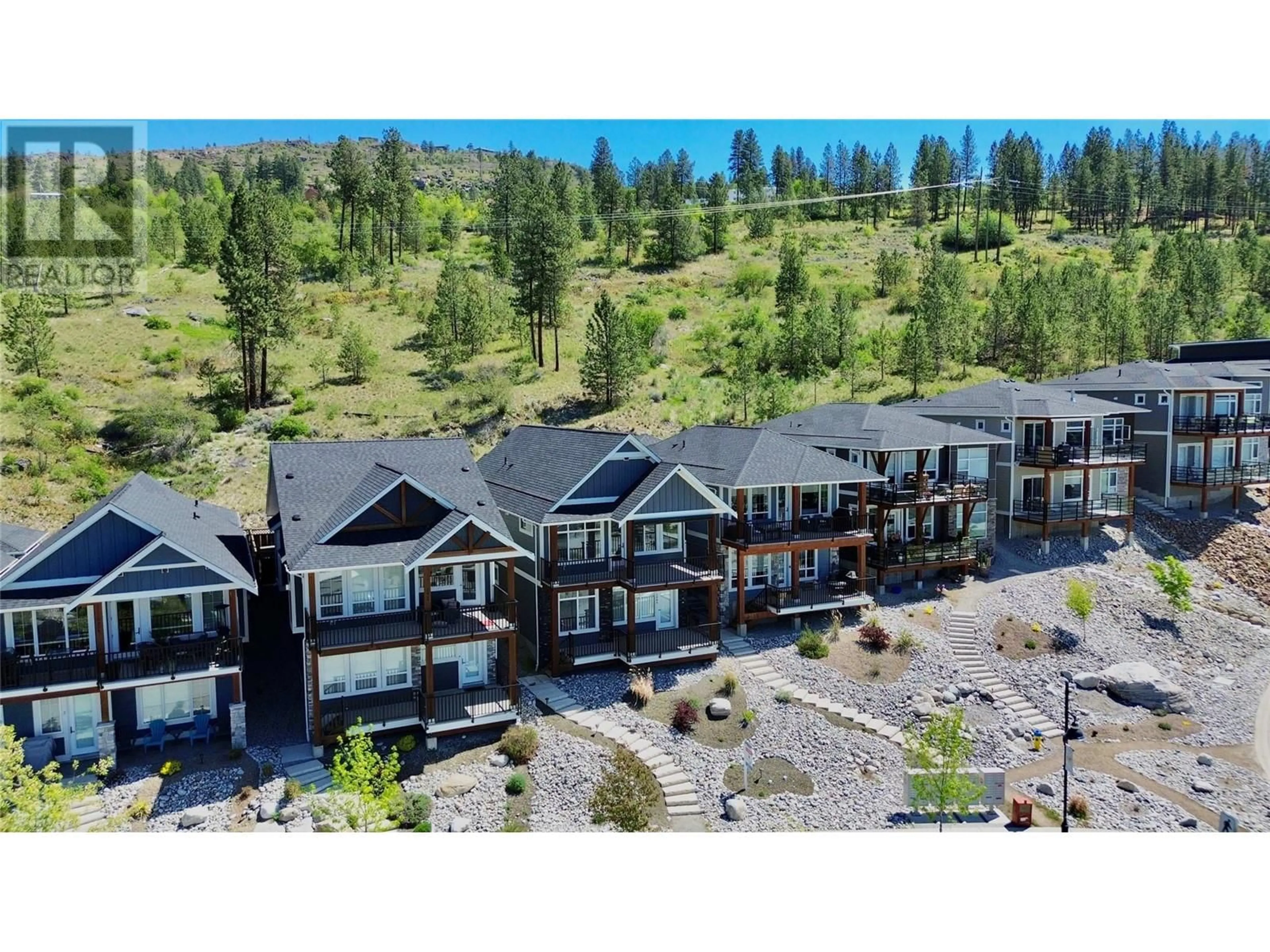 A pic from outside/outdoor area/front of a property/back of a property/a pic from drone, mountain view for 1046 HOLDEN ROAD, Penticton British Columbia V2A9G4