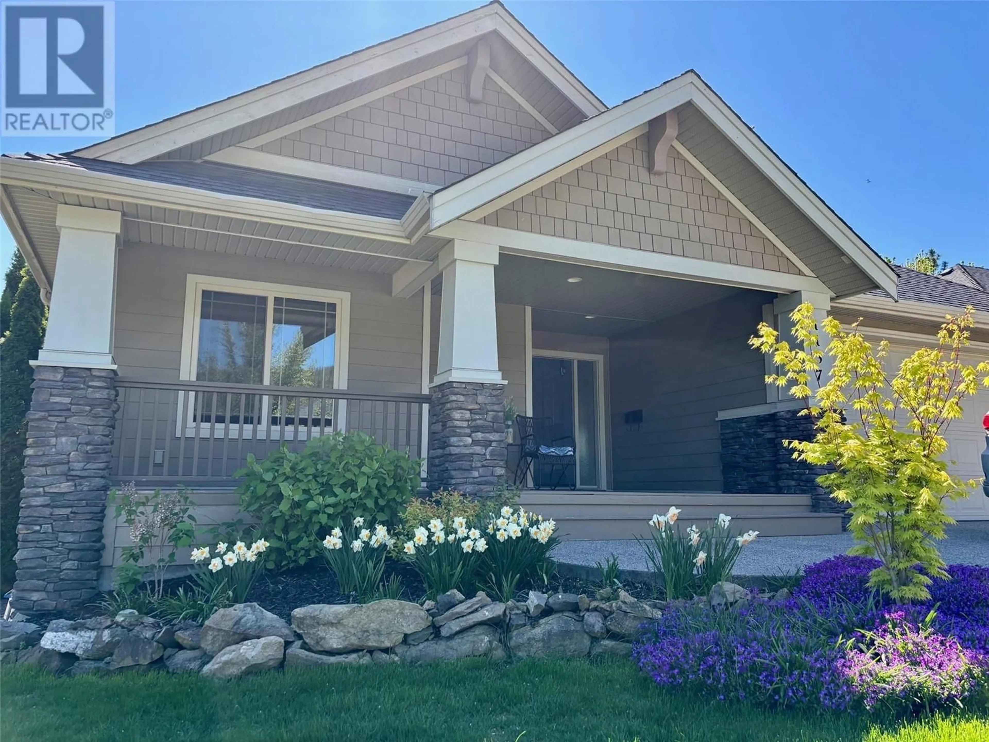 Home with vinyl exterior material, street for 1137 LONG RIDGE DRIVE, Kelowna British Columbia V1V2W9