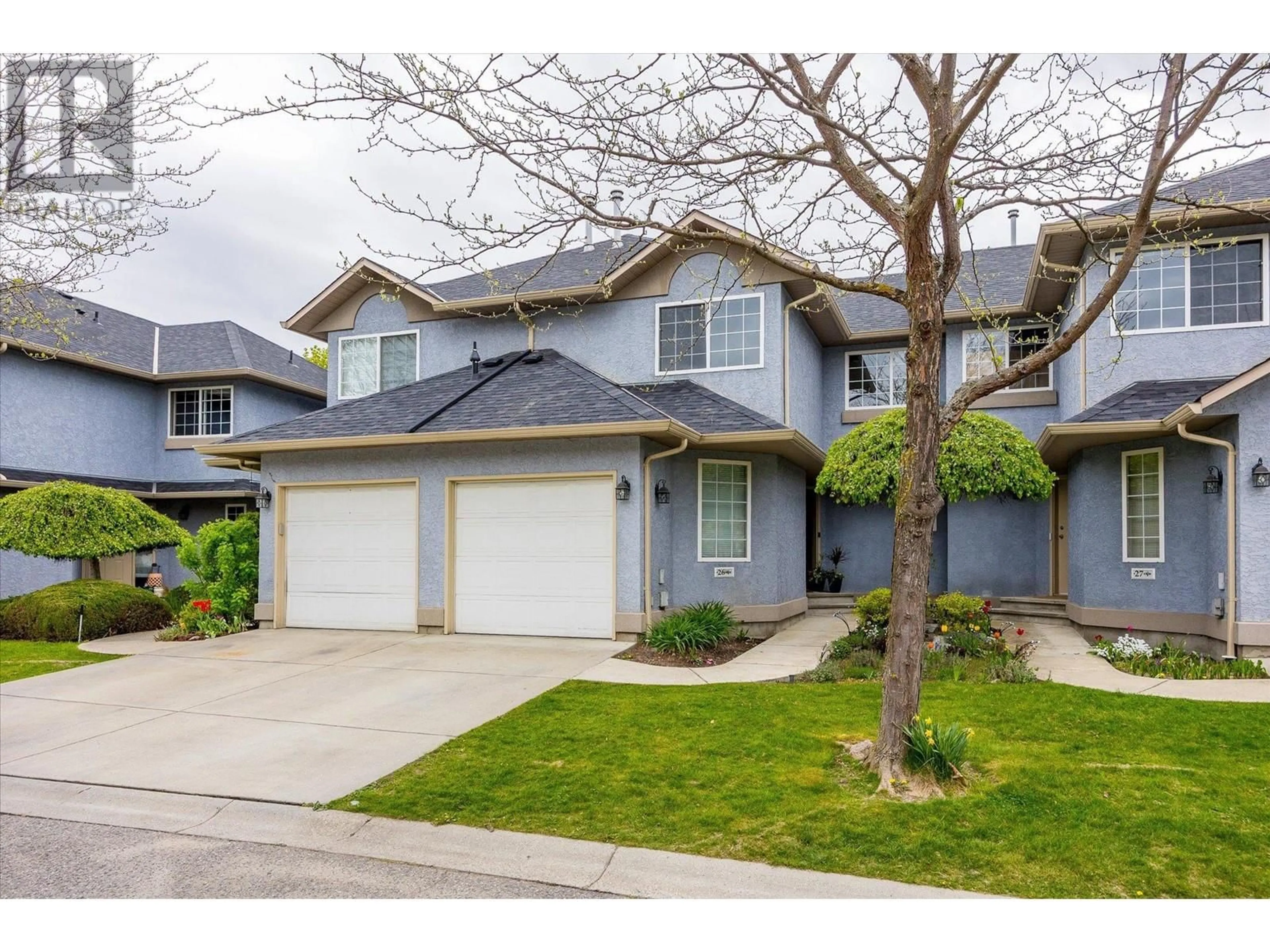 Home with vinyl exterior material, street for 26 - 316 WHITMAN ROAD, Kelowna British Columbia V1V1Y9
