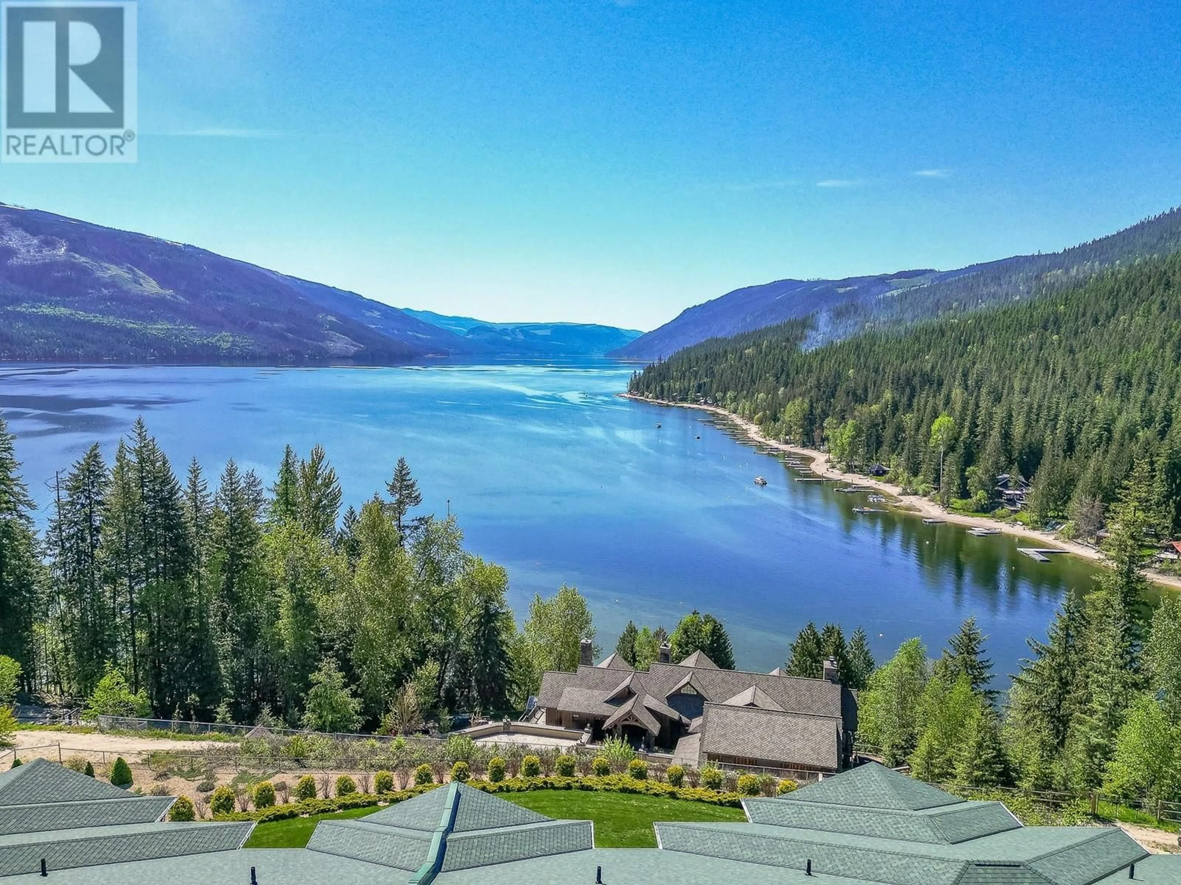 A pic from outside/outdoor area/front of a property/back of a property/a pic from drone, water/lake/river/ocean view for A304 - 3460 PARKWAY ROAD, Enderby British Columbia V0E1V5