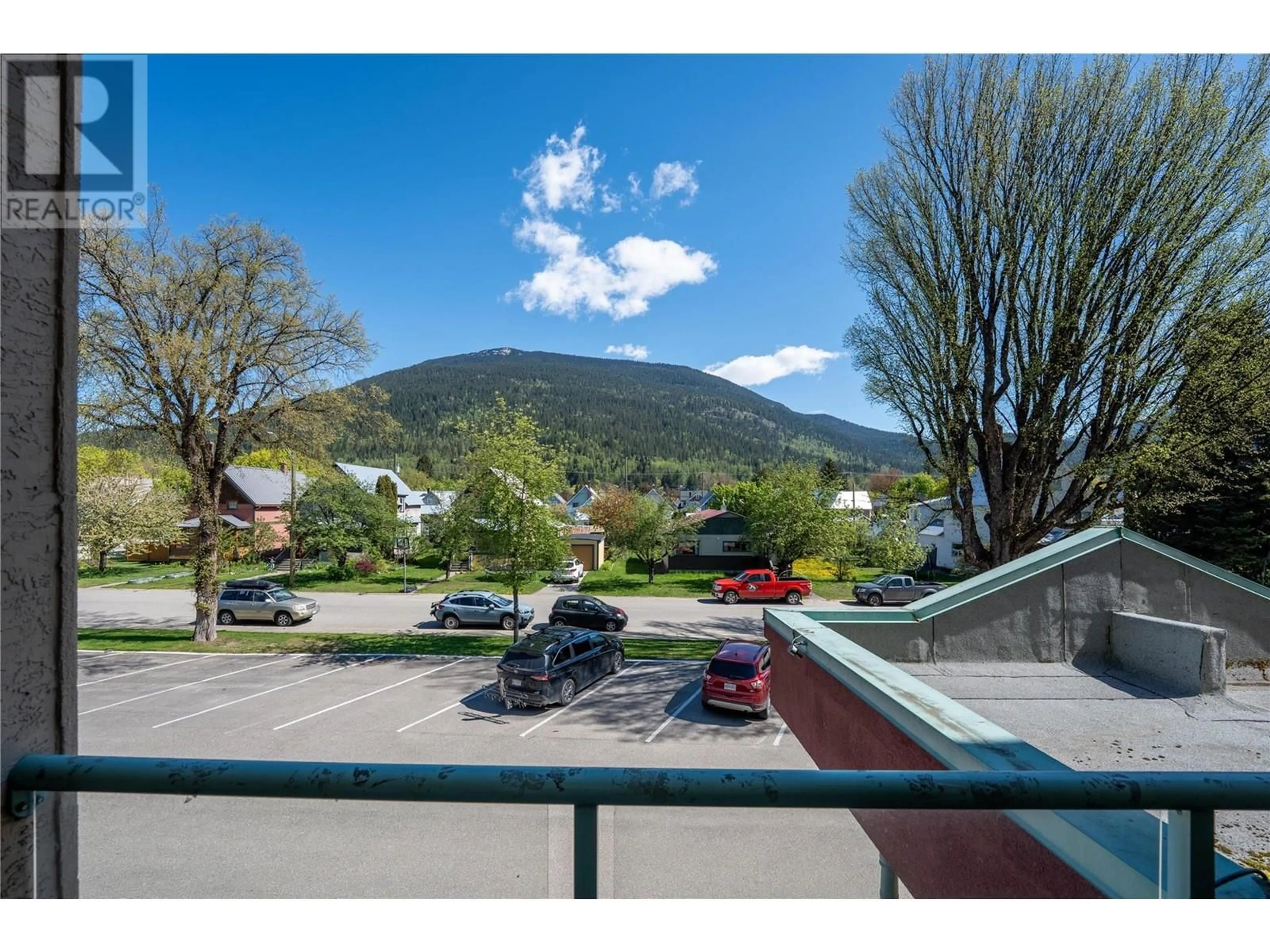 A pic from outside/outdoor area/front of a property/back of a property/a pic from drone, mountain view for 209 - 311 SIXTH STREET EAST, Revelstoke British Columbia V0E2S0