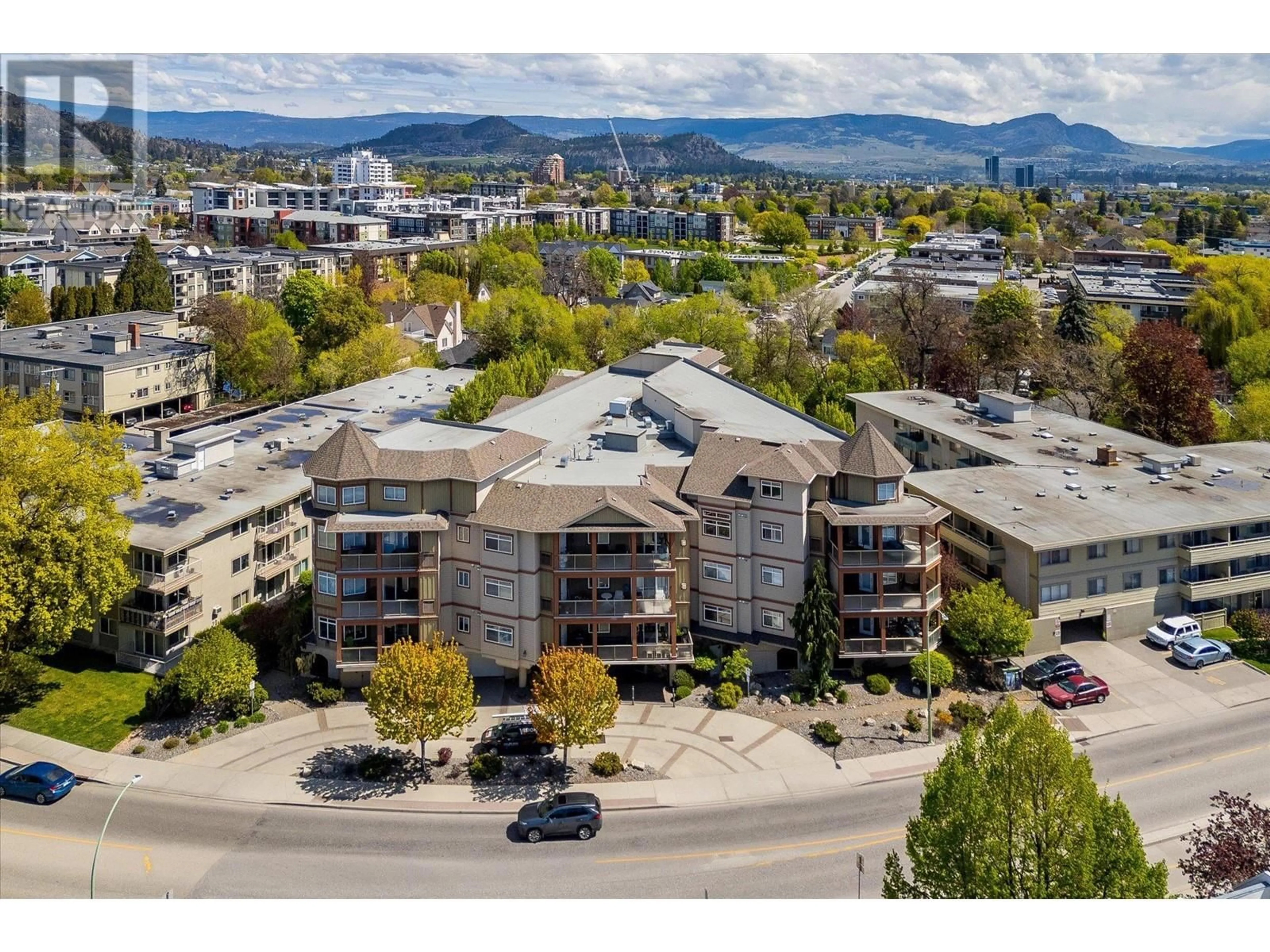 A pic from outside/outdoor area/front of a property/back of a property/a pic from drone, mountain view for 303 - 1905 PANDOSY STREET, Kelowna British Columbia V1Y1R8