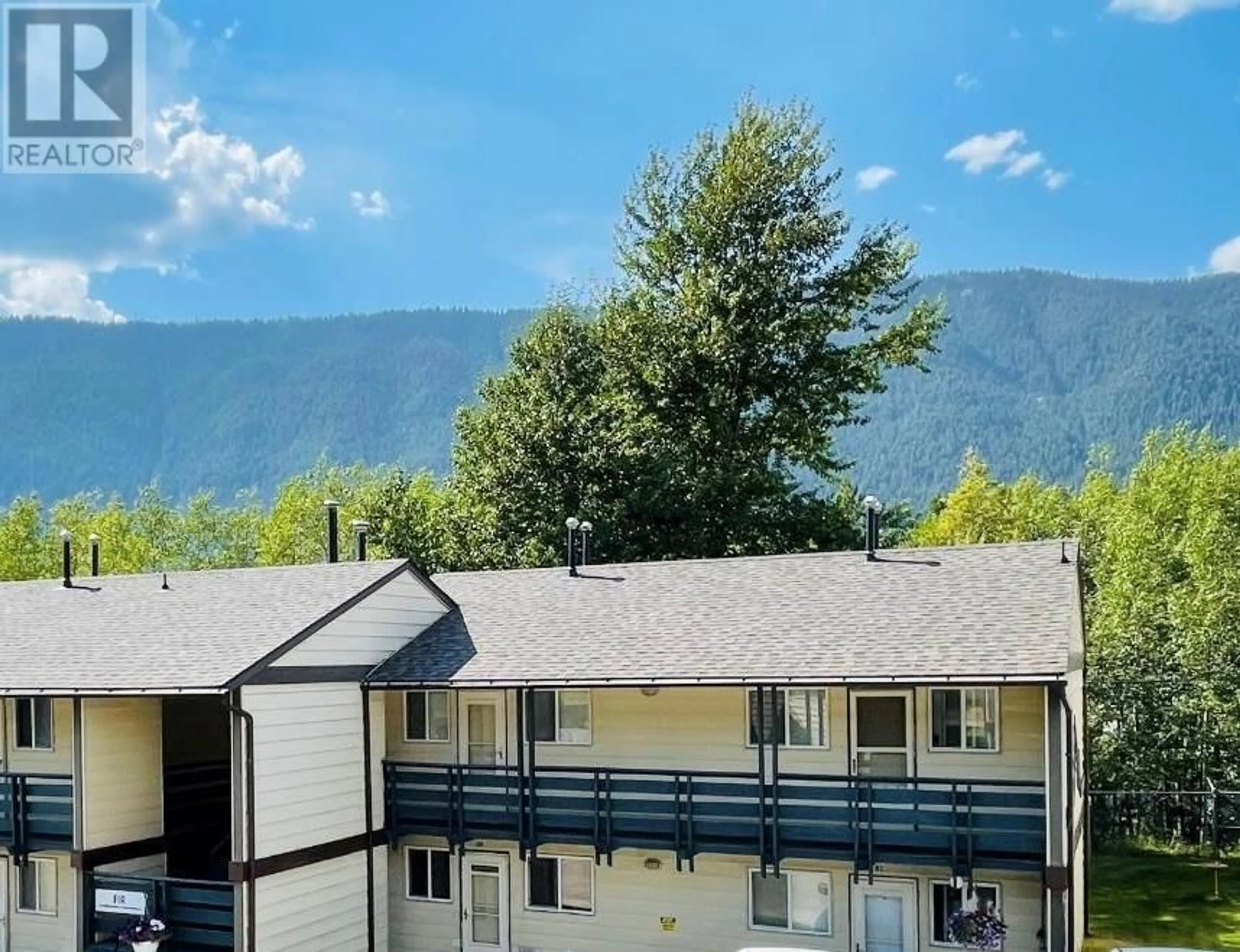 A pic from outside/outdoor area/front of a property/back of a property/a pic from drone, mountain view for B21 - 100 RED CEDAR DRIVE, Sparwood British Columbia V0B2G0