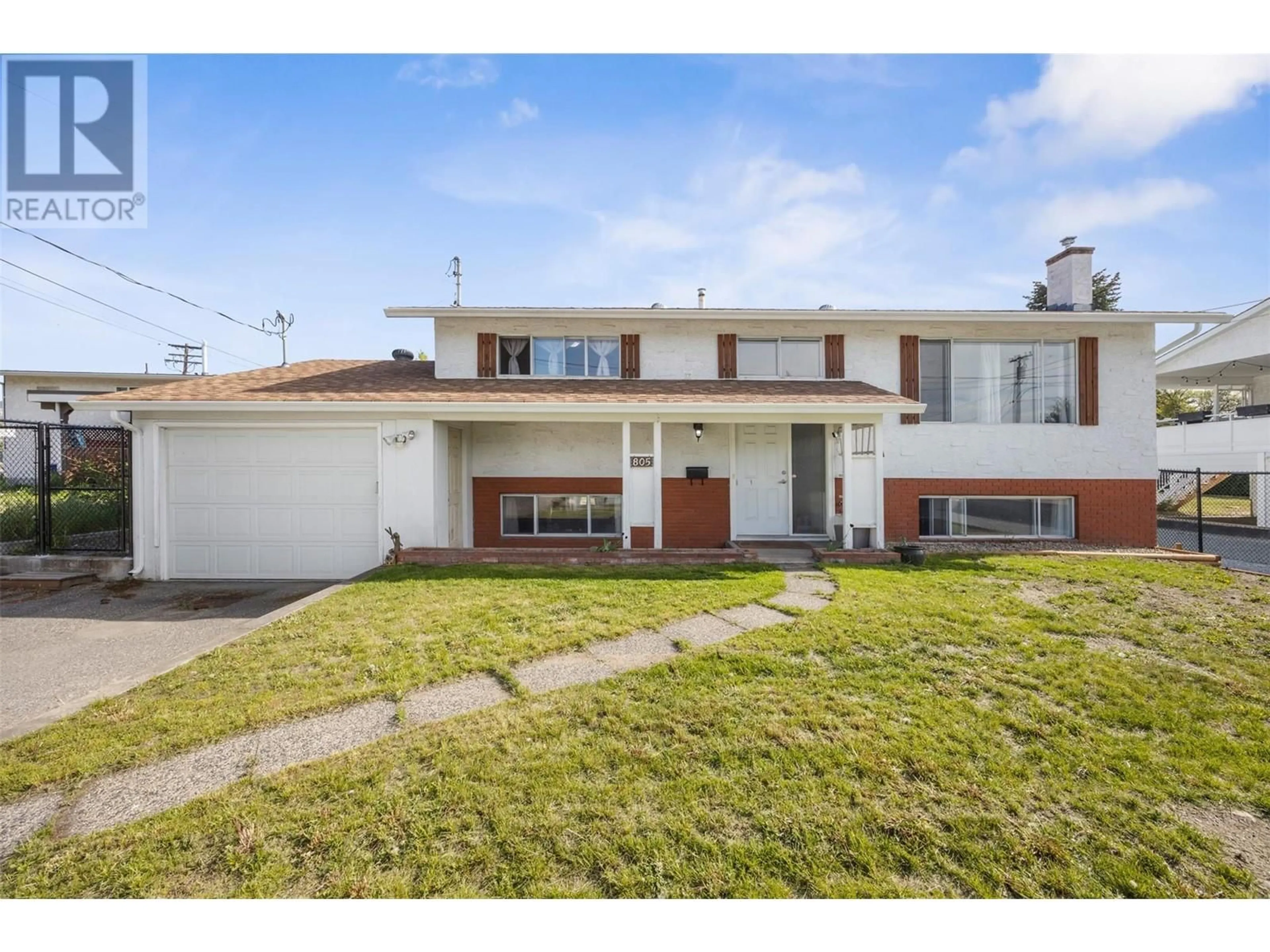 A pic from outside/outdoor area/front of a property/back of a property/a pic from drone, street for 805 BRIAN ROAD, Kelowna British Columbia V1X1H5