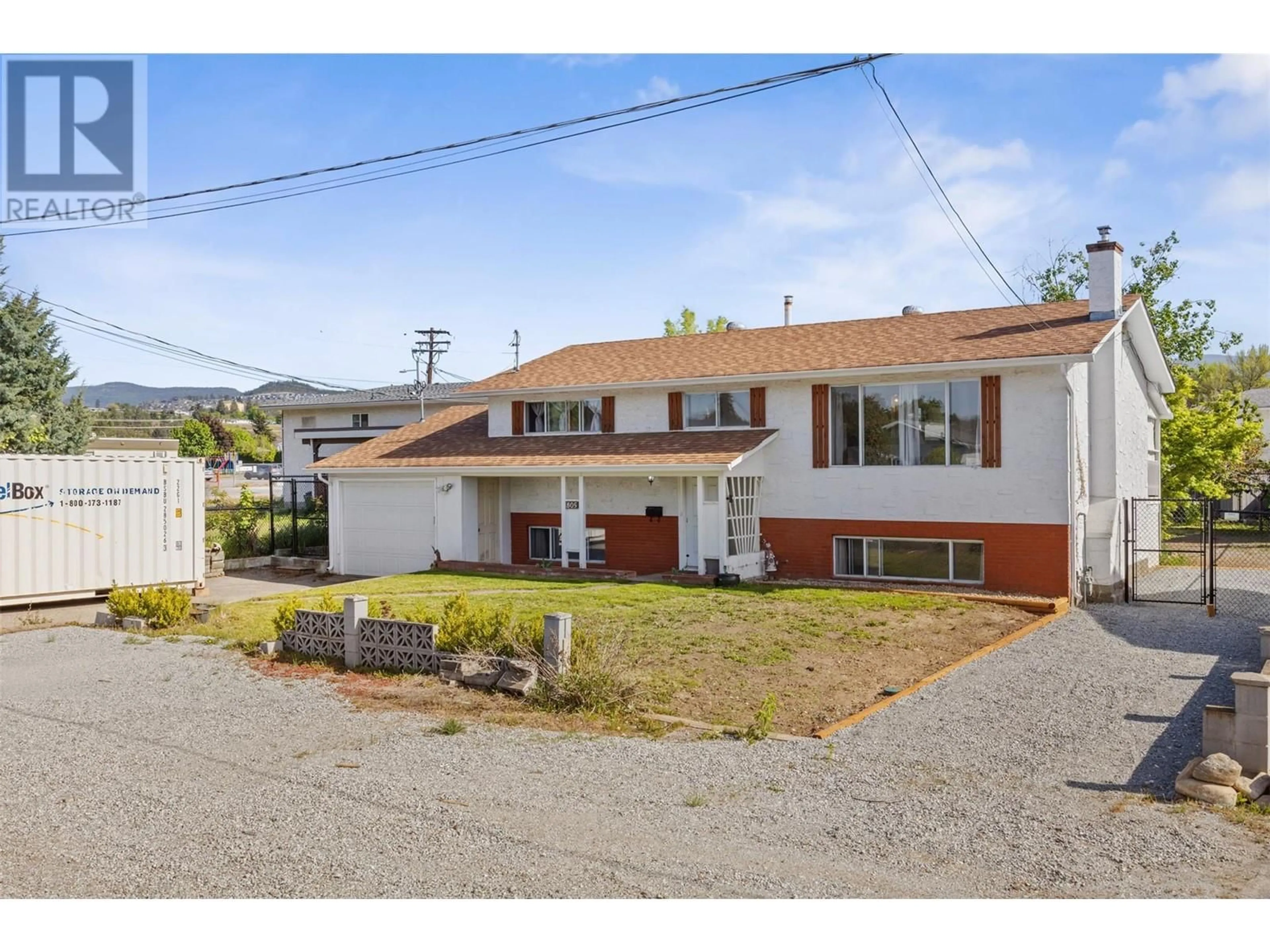 A pic from outside/outdoor area/front of a property/back of a property/a pic from drone, street for 805 BRIAN ROAD, Kelowna British Columbia V1X1H5