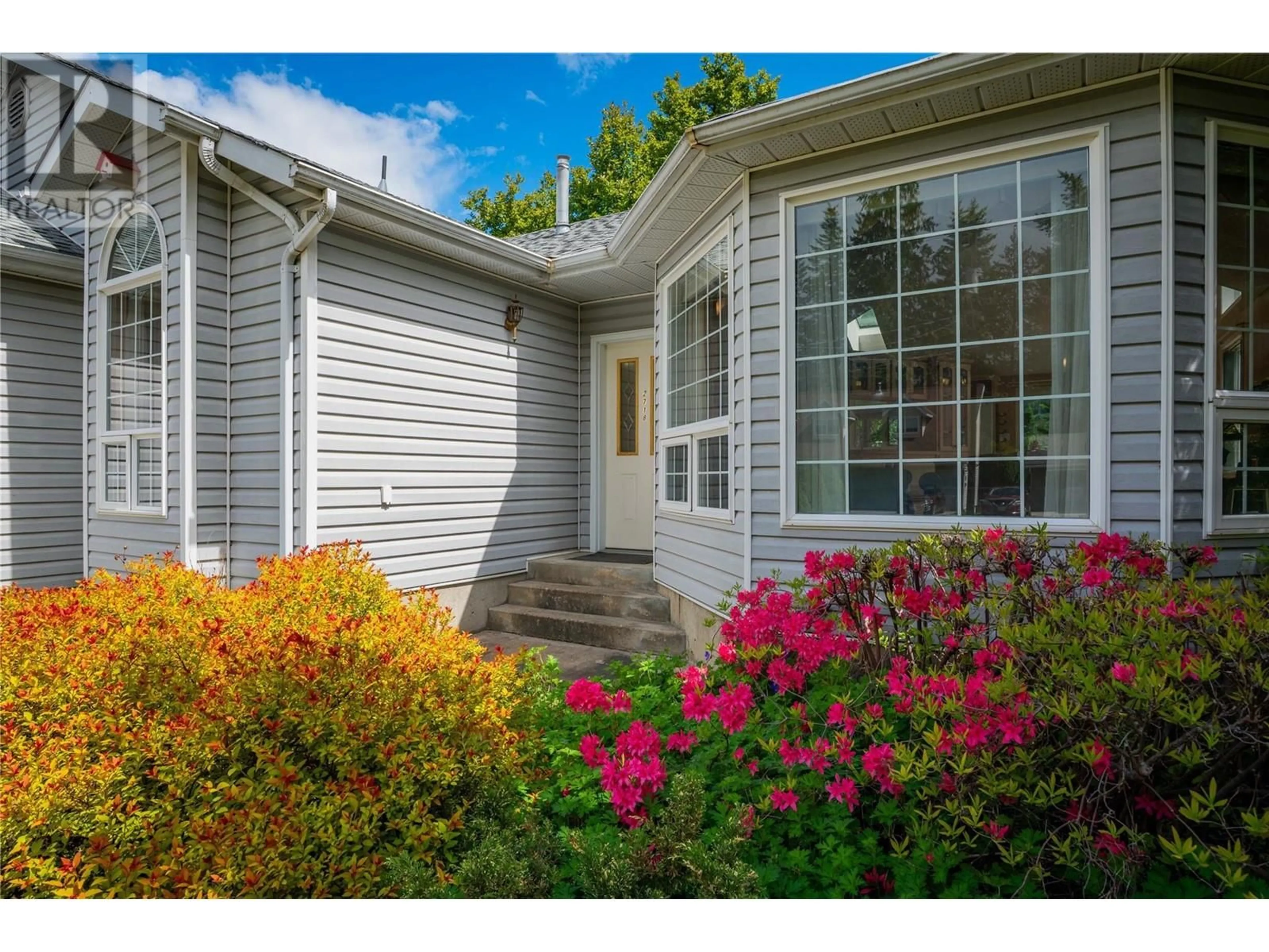 Home with vinyl exterior material, street for 2718 FIR DRIVE, South Slocan British Columbia V0G2G1