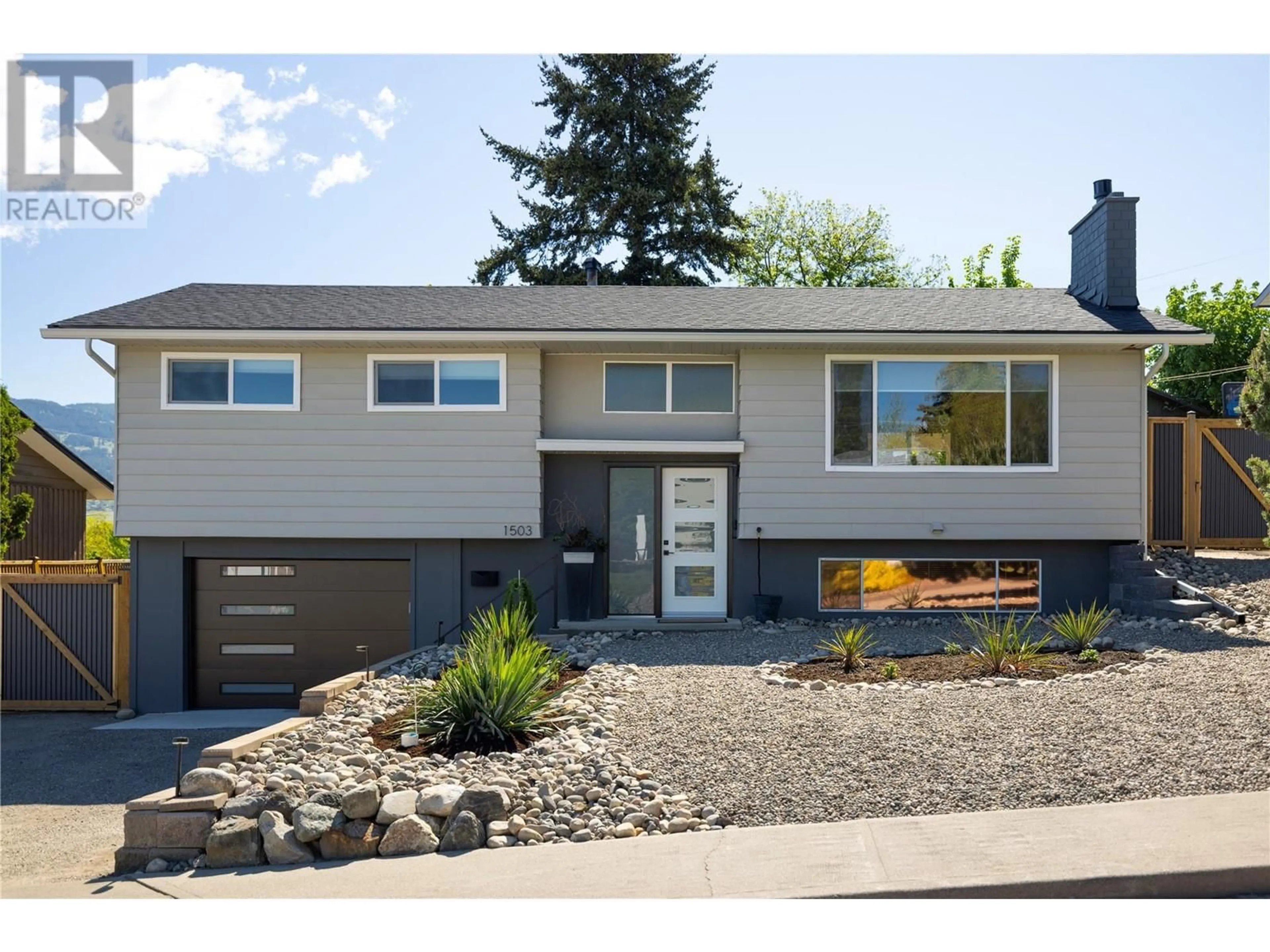 Home with vinyl exterior material, street for 1503 34A STREET, Vernon British Columbia V1T5Z6