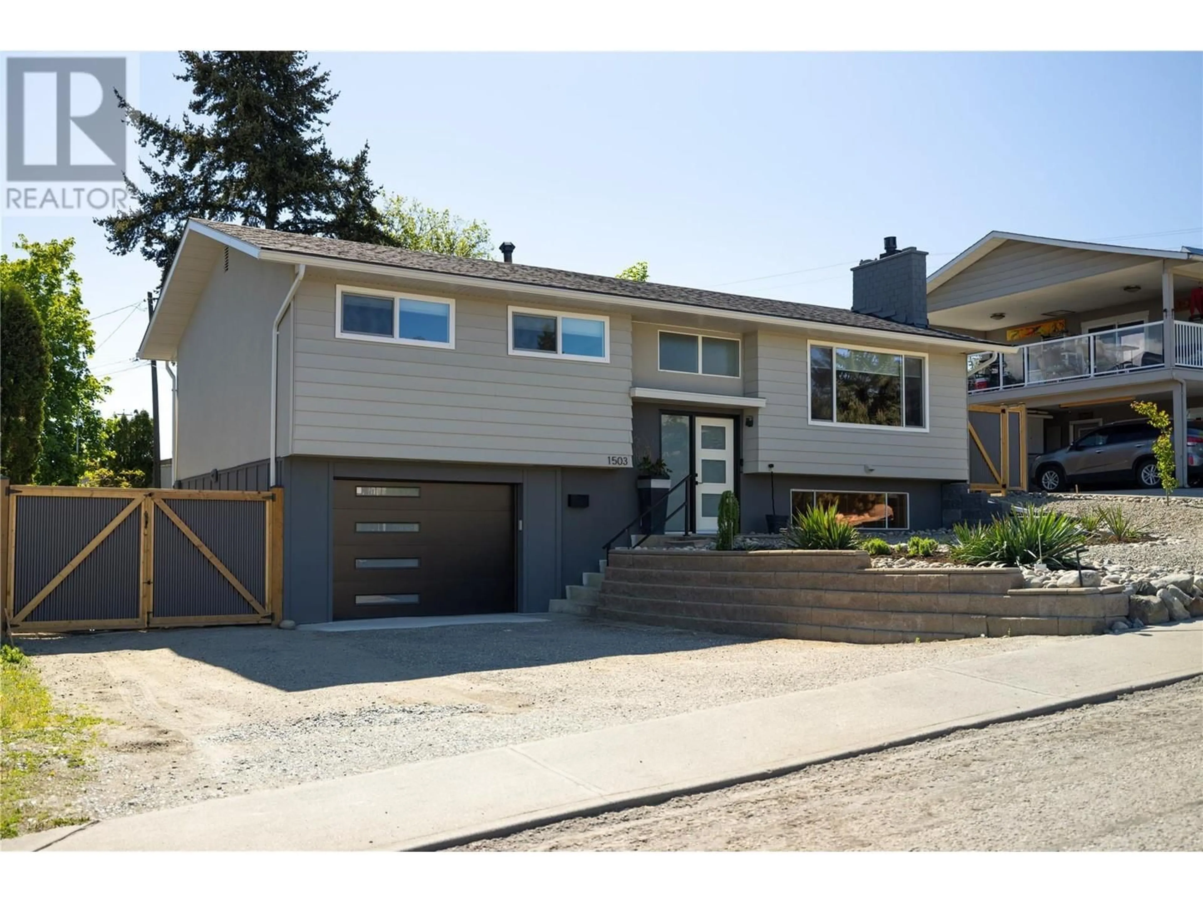 Home with vinyl exterior material, street for 1503 34A STREET, Vernon British Columbia V1T5Z6