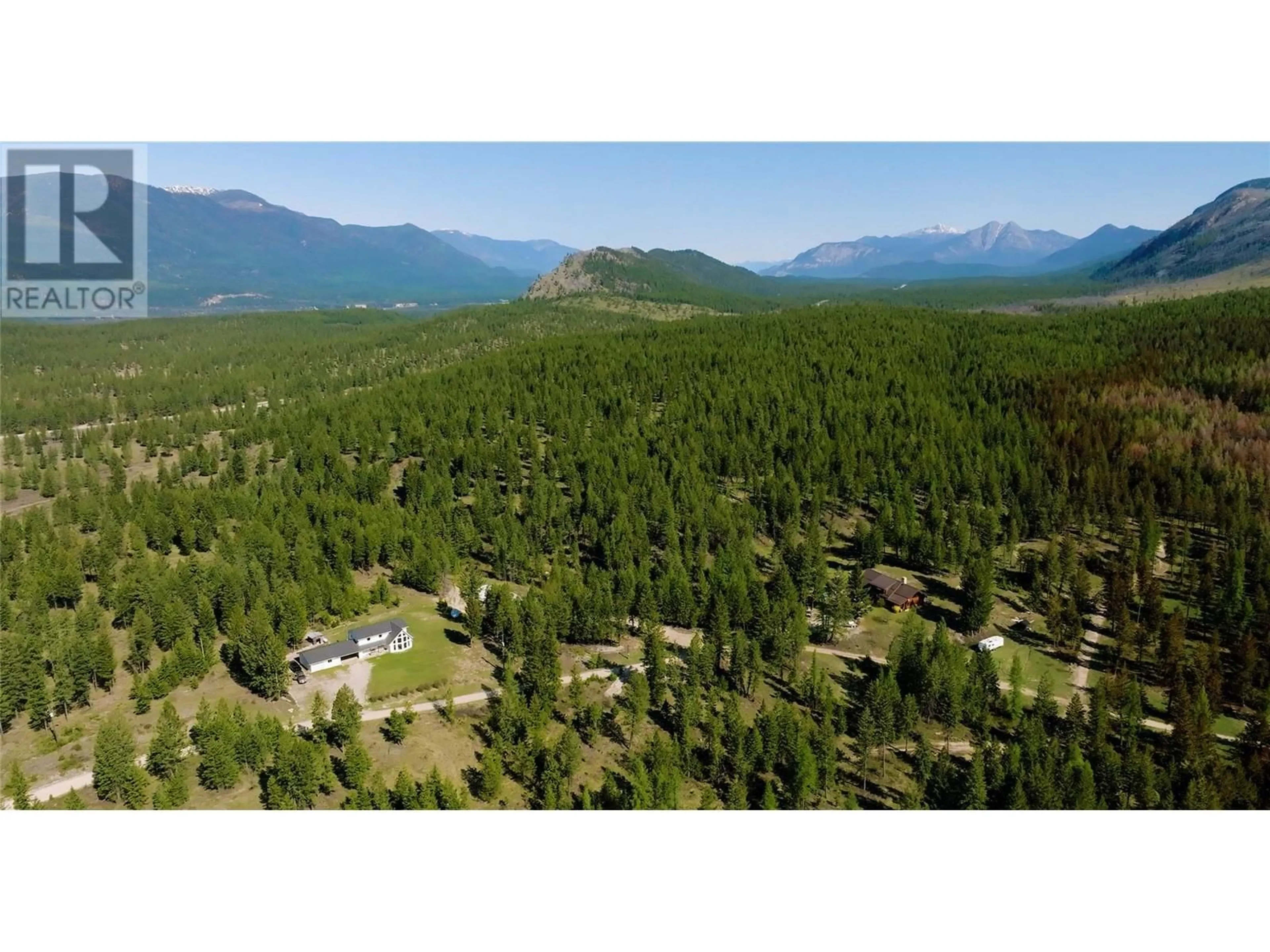 A pic from outside/outdoor area/front of a property/back of a property/a pic from drone, mountain view for 3200 HIGHWAY 93/95 HIGHWAY, Canal Flats British Columbia V0B2E0