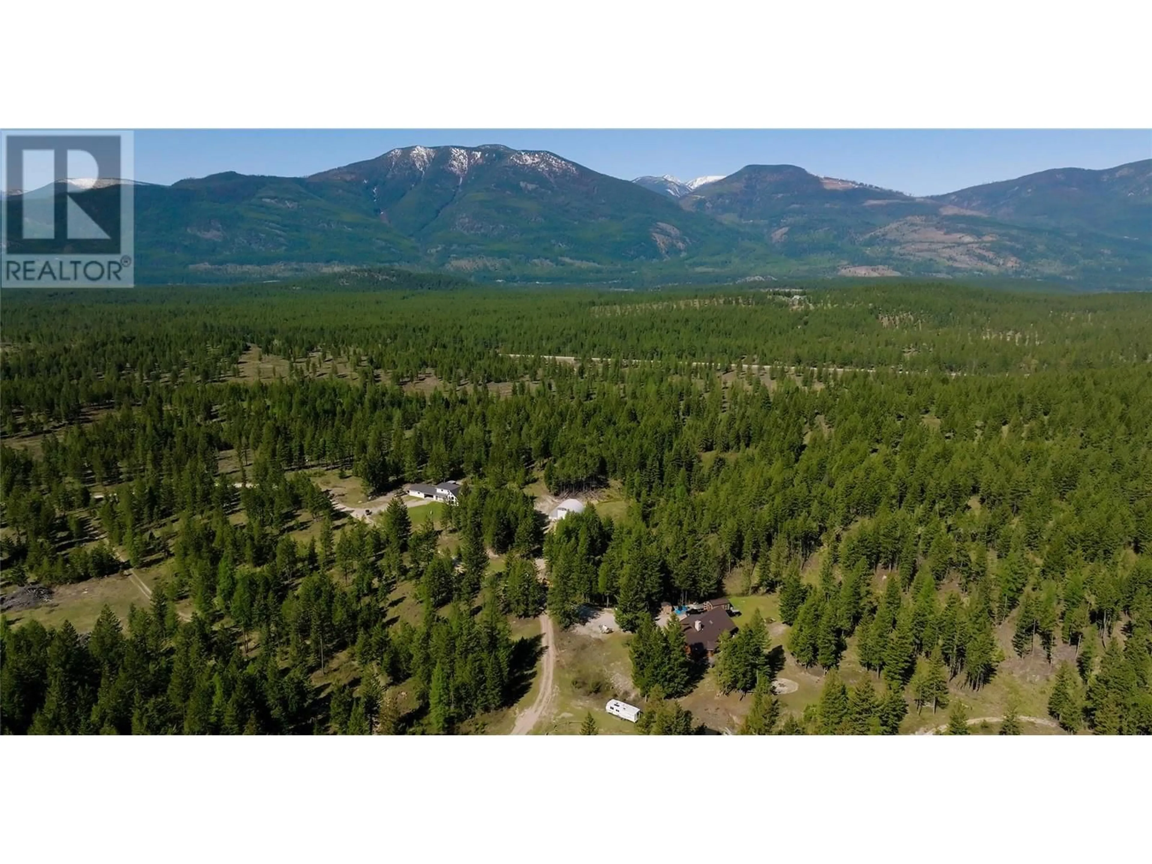 A pic from outside/outdoor area/front of a property/back of a property/a pic from drone, mountain view for 3200 HIGHWAY 93/95 HIGHWAY, Canal Flats British Columbia V0B2E0