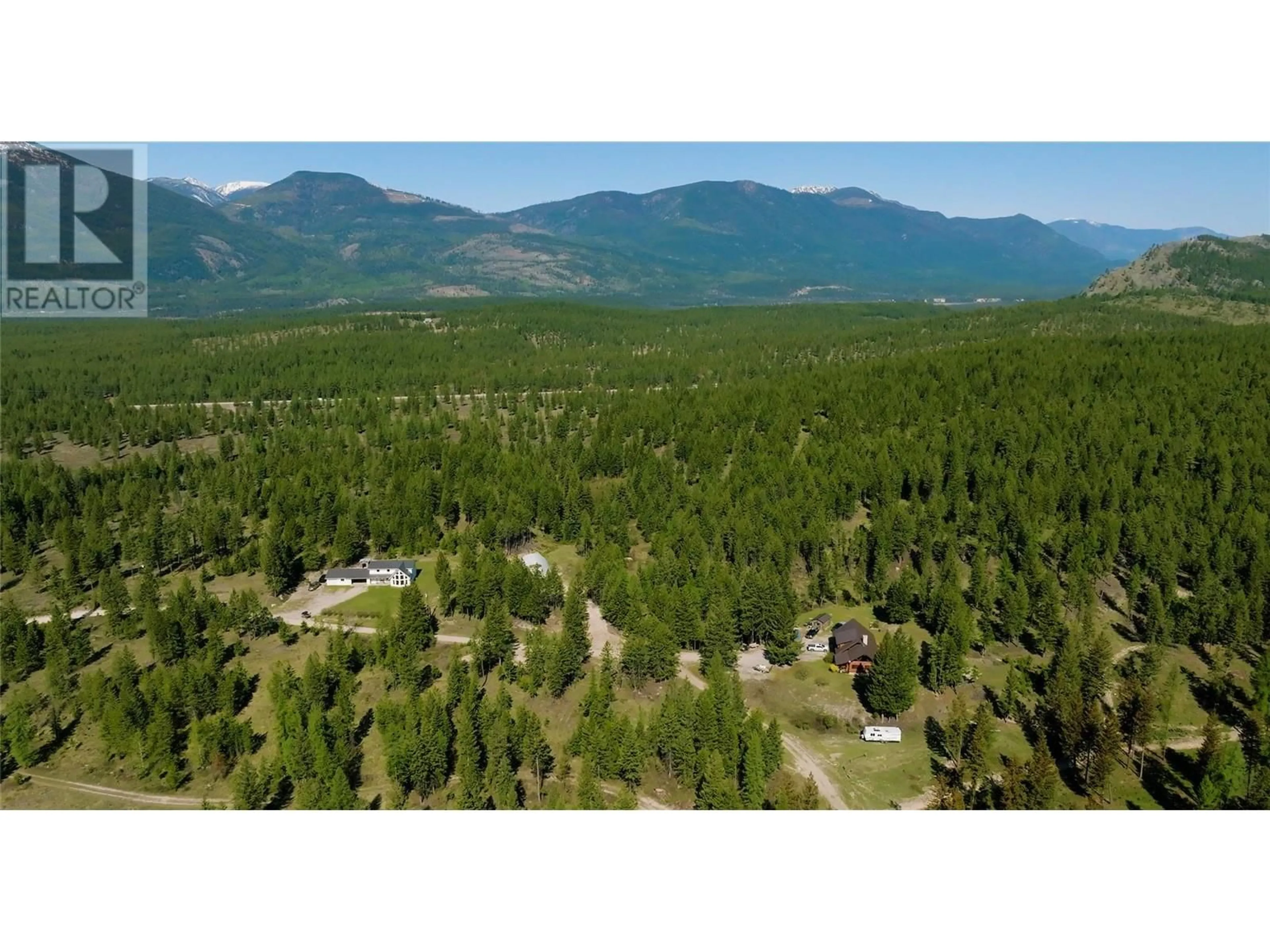 A pic from outside/outdoor area/front of a property/back of a property/a pic from drone, forest/trees view for 3200 HIGHWAY 93/95 HIGHWAY, Canal Flats British Columbia V0B2E0