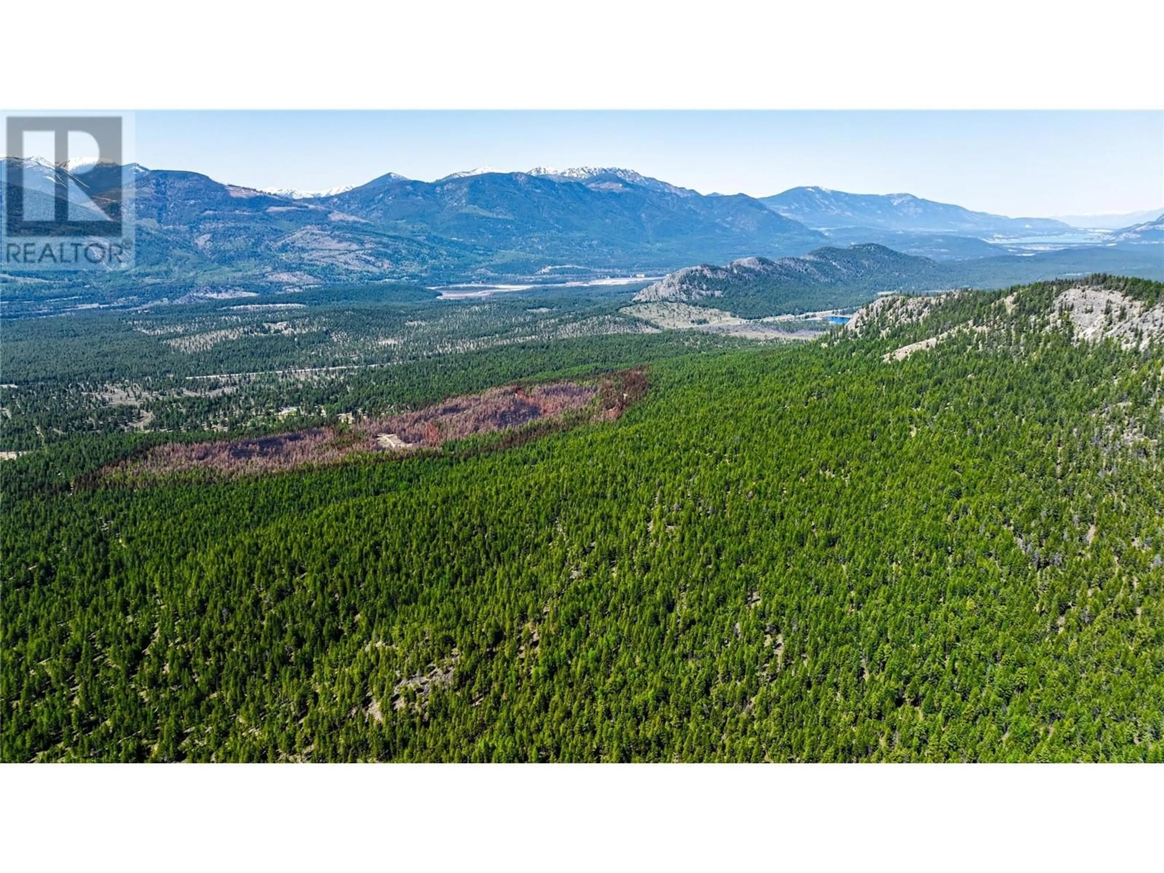 A pic from outside/outdoor area/front of a property/back of a property/a pic from drone, forest/trees view for 3200 HIGHWAY 93/95 HIGHWAY, Canal Flats British Columbia V0B2E0