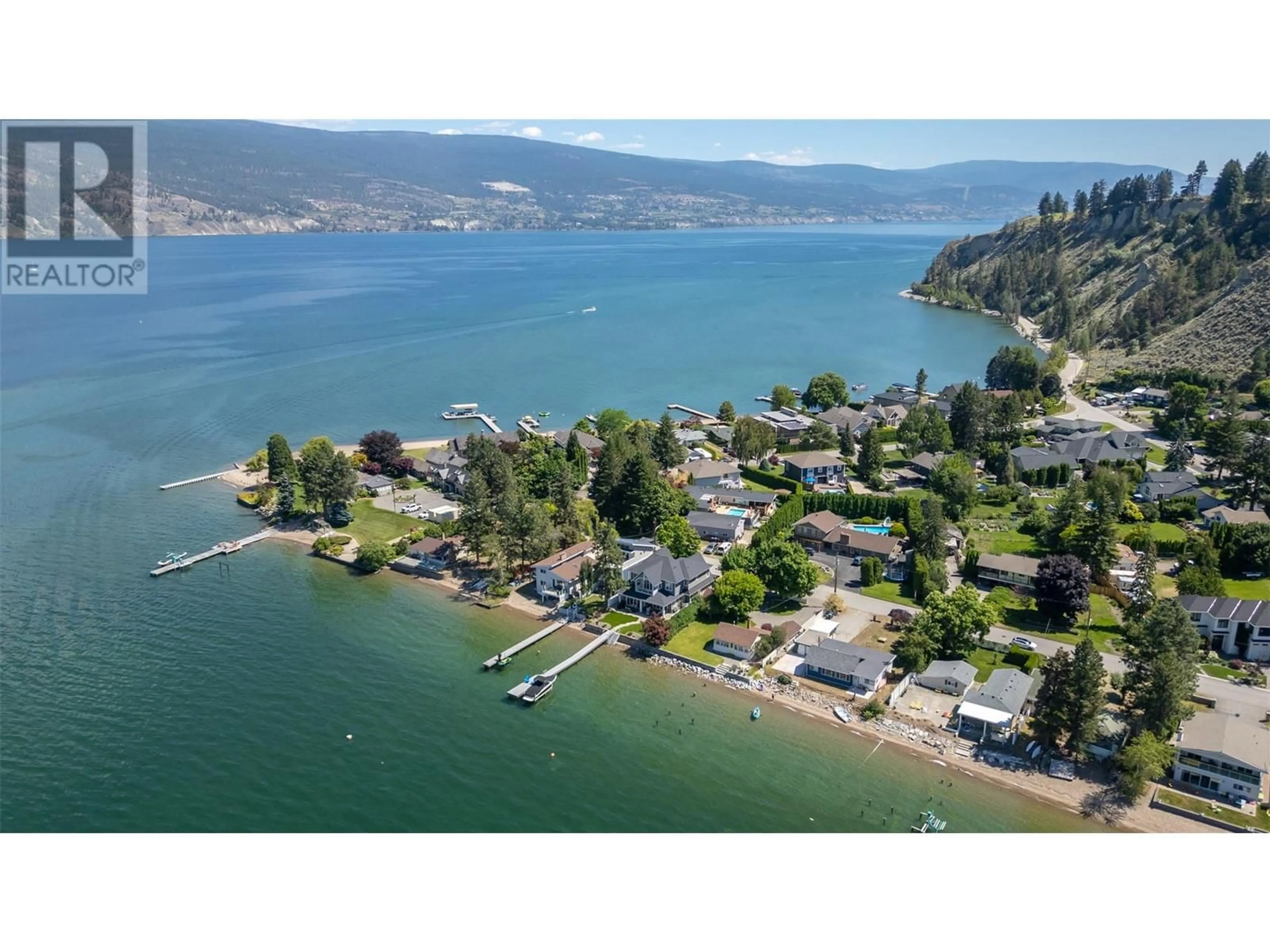 A pic from outside/outdoor area/front of a property/back of a property/a pic from drone, water/lake/river/ocean view for 19235 LAKESHORE DRIVE NORTH, Summerland British Columbia V0H1Z6